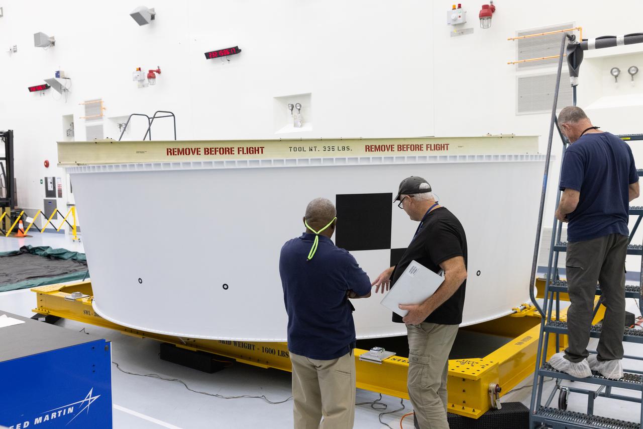 Technicians at NASA’s Kennedy Space Center in Florida complete routine inspections the Artemis II Orion stage adapter on Wednesday, Aug. 20, 2025, to the spaceport’s Multi-Payload Processing Facility to undergo CubeSat integration following its arrival from the agency’s Marshall Space Flight Center in Huntsville, Alabama. NASA Marshall built the Orion stage adapter which connects to the SLS (Space Launch System) rocket’s interim cryogenic propulsion stage to the Orion spacecraft and protects Orion from flammable gases generated during launch. The Artemis II test flight will take four astronauts around the Moon and return them back home in early 2026.