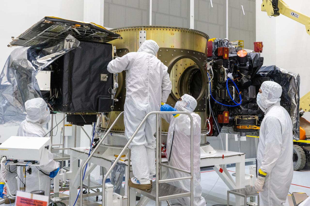 Technicians integrate NASA’s Carruthers Geocorona Observatory and the National Oceanic and Atmospheric Administration’s (NOAA) Space Weather Follow On Lagrange - 1 (SWFO-L1) satellite to the Evolved Expendable Launch Vehicle Secondary Payload Adapter Array Ring (ESPA) inside the Astrotech Space Operations Facility near NASA’s Kennedy Space Center in Florida on Friday, Sept. 5, 2025. The integration of the rideshares prepares for the next milestone of attaching NASA’s IMAP (Interstellar Mapping and Acceleration Probe) Sun mapping observatory to a payload adapter and stacking all three observatories together to prepare them for encapsulation in the payload fairing.