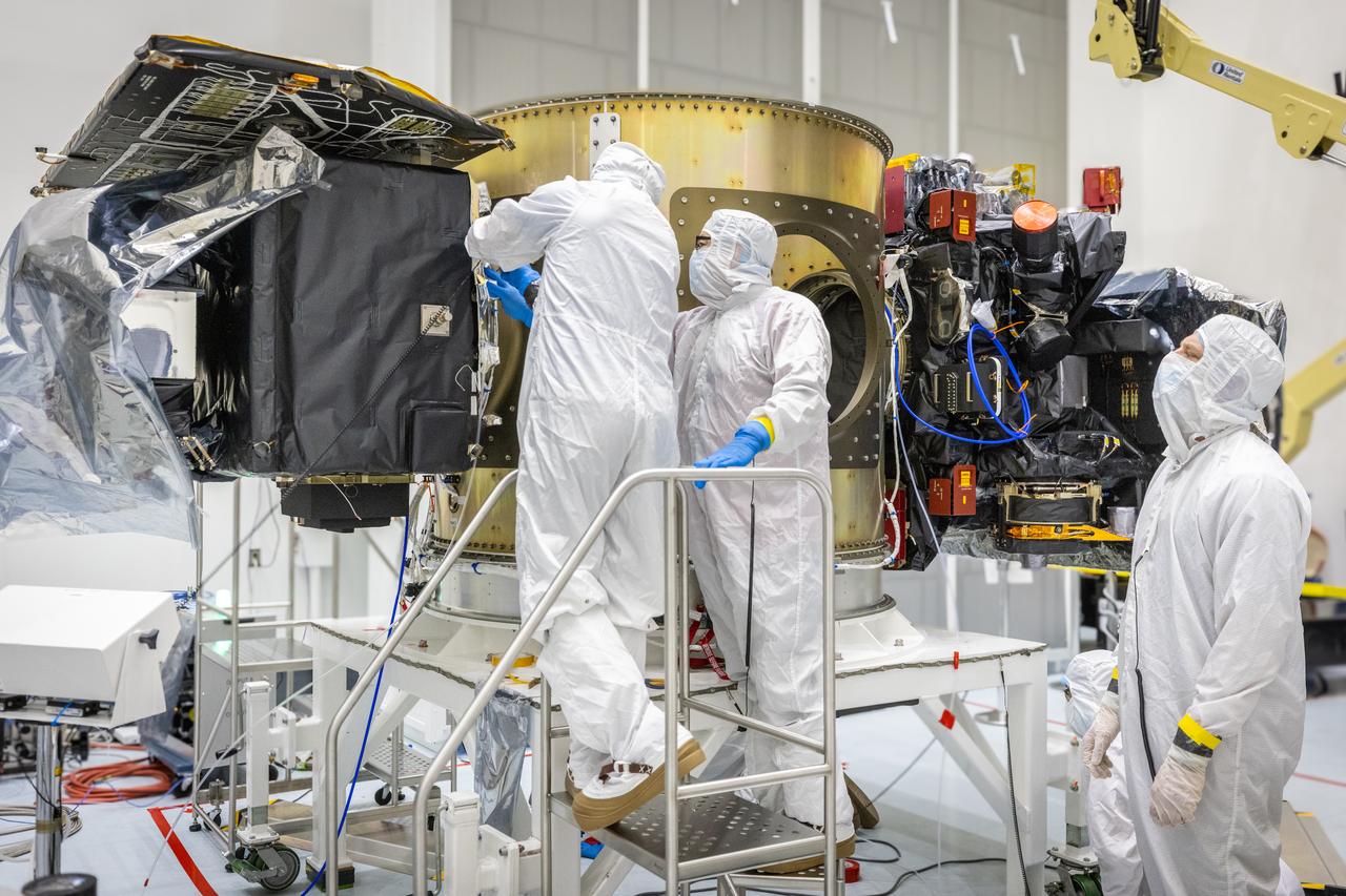 Technicians integrate NASA’s Carruthers Geocorona Observatory and the National Oceanic and Atmospheric Administration’s (NOAA) Space Weather Follow On Lagrange - 1 (SWFO-L1) satellite to the Evolved Expendable Launch Vehicle Secondary Payload Adapter Array Ring (ESPA) inside the Astrotech Space Operations Facility near NASA’s Kennedy Space Center in Florida on Friday, Sept. 5, 2025. The integration of the rideshares prepares for the next milestone of attaching NASA’s IMAP (Interstellar Mapping and Acceleration Probe) Sun mapping observatory to a payload adapter and stacking all three observatories together to prepare them for encapsulation in the payload fairing.