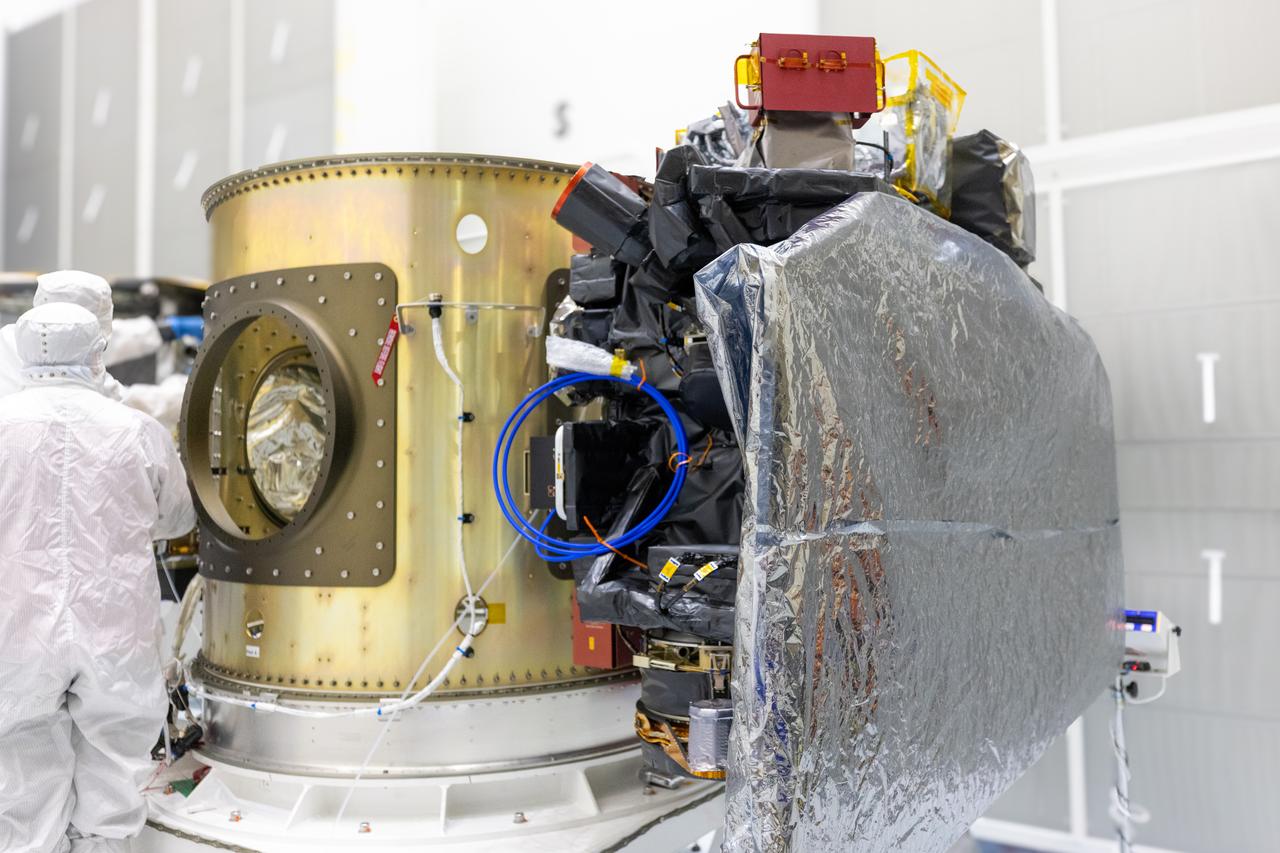 Technicians integrate NASA’s Carruthers Geocorona Observatory and the National Oceanic and Atmospheric Administration’s (NOAA) Space Weather Follow On Lagrange - 1 (SWFO-L1) satellite to the Evolved Expendable Launch Vehicle Secondary Payload Adapter Array Ring (ESPA) inside the Astrotech Space Operations Facility near NASA’s Kennedy Space Center in Florida on Friday, Sept. 5, 2025. The integration of the rideshares prepares for the next milestone of attaching NASA’s IMAP (Interstellar Mapping and Acceleration Probe) Sun mapping observatory to a payload adapter and stacking all three observatories together to prepare them for encapsulation in the payload fairing.
