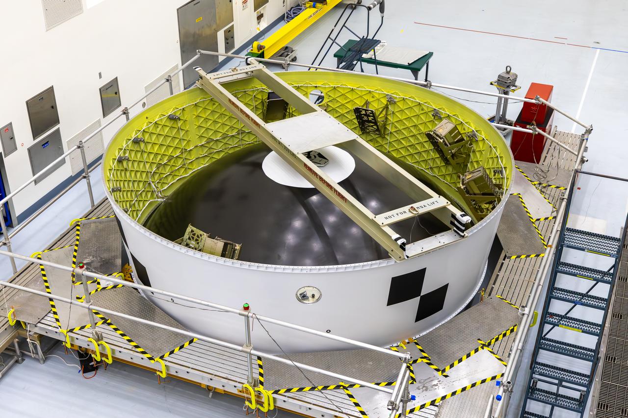 Technicians completed installation of the German Aerospace Center TACHELES CubeSat within the Orion stage adapter inside the Multi-Payload Processing Facility at NASA’s Kennedy Space Center in Florida on Wednesday, Sept. 17, 2025. The TACHELES CubeSat, about the size of a shoebox, is one of the CubeSats slated to fly on NASA’s Artemis II test flight in 2026. Deploying in high Earth orbit from a spacecraft adapter on NASA’s SLS (Space Launch System) rocket after Orion is safely flying on its own with its crew of four astronauts, TACHELES will collect measurements on the effects of the space environment on electrical components to inform technologies for lunar vehicles.