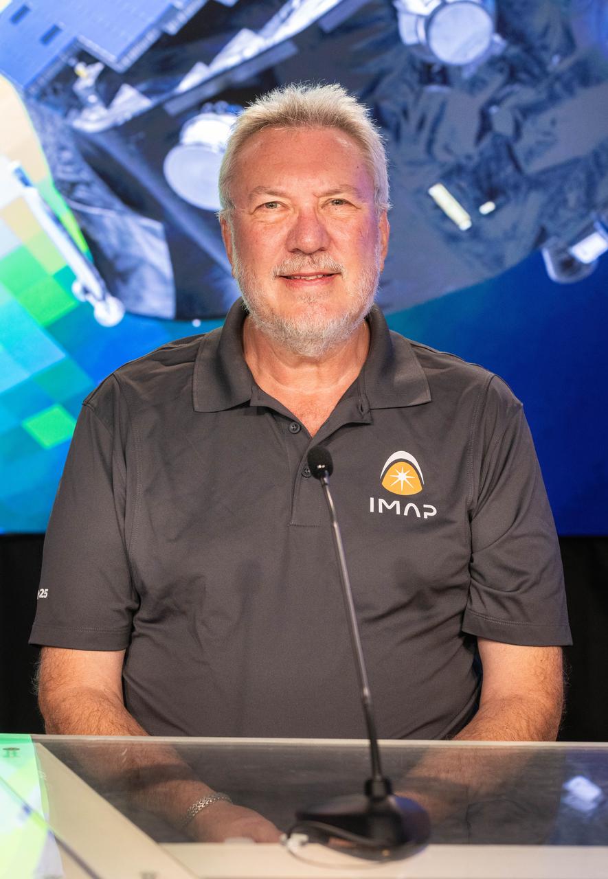 David McComas, IMAP principal investigator, Princeton University, participates in a science briefing on NASA’s IMAP (Interstellar Mapping and Acceleration Probe) mission and its two rideshares – NASA’s exosphere-studying Carruthers Geocorona Observatory and National Oceanic and Atmospheric Administration’s (NOAA) Space Weather Follow On–Lagrange 1 (SWFO-L1) observatory – at the agency’s Kennedy Space Center in Florida on Sunday, Sept. 21, 2025. NASA’s IMAP will use 10 science instruments to study and map the heliosphere, a vast magnetic bubble surrounding the Sun protecting our solar system from radiation incoming from interstellar space. The three missions will orbit the Sun near Lagrange point 1, about one million miles from Earth. Launch is targeted for 7:32 a.m. EDT, Tuesday, Sept. 23, from Launch Complex 39A at NASA Kennedy.