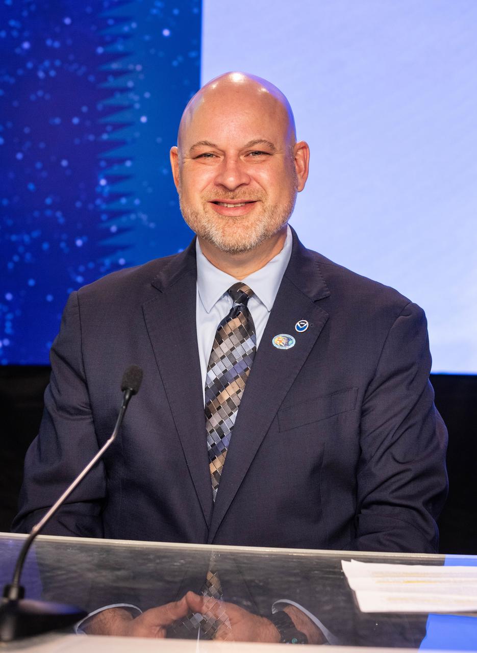 Clinton Wallace, director, National Oceanic and Atmospheric Administration (NOAA) Space Weather Prediction Center, participates in a science briefing on NASA’s IMAP (Interstellar Mapping and Acceleration Probe) mission and its two rideshares – NASA’s exosphere-studying Carruthers Geocorona Observatory and NOAA’s Space Weather Follow On–Lagrange 1 (SWFO-L1) observatory – at the agency’s Kennedy Space Center in Florida on Sunday, Sept. 21, 2025. NASA’s IMAP will use 10 science instruments to study and map the heliosphere, a vast magnetic bubble surrounding the Sun protecting our solar system from radiation incoming from interstellar space. The three missions will orbit the Sun near Lagrange point 1, about one million miles from Earth. Launch is targeted for 7:32 a.m. EDT, Tuesday, Sept. 23, from Launch Complex 39A at NASA Kennedy.