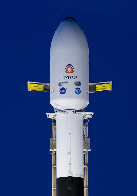 A SpaceX Falcon 9 rocket with NASA’s IMAP (Interstellar Mapping and Acceleration Probe), the agency’s Carruthers Geocorona Observatory, and National Oceanic and Atmospheric Administration’s (NOAA) Space Weather Follow On–Lagrange 1 (SWFO-L1) spacecraft stands vertical at Launch Complex 39A during early morning on Monday, Sept. 22, 2025, at the agency’s Kennedy Space Center in Florida. NASA’s IMAP will use 10 science instruments to study and map the heliosphere, a vast magnetic bubble surrounding the Sun protecting our solar system from radiation incoming from interstellar space. NASA’s IMAP will scan the heliosphere, analyze the composition of charged particles, and investigate how those particles move through the solar system.