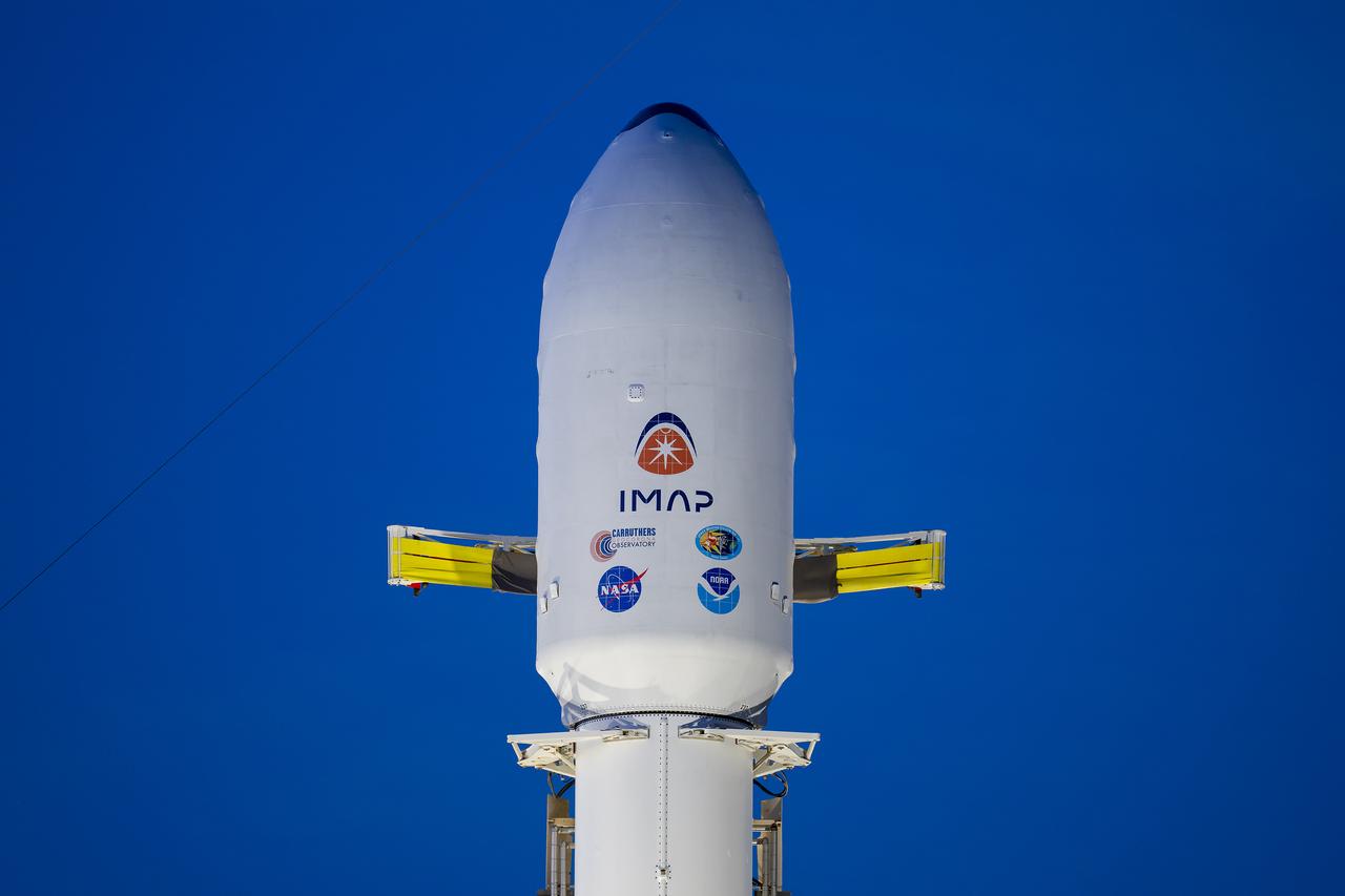 A SpaceX Falcon 9 rocket with NASA’s IMAP (Interstellar Mapping and Acceleration Probe), the agency’s Carruthers Geocorona Observatory, and National Oceanic and Atmospheric Administration’s (NOAA) Space Weather Follow On–Lagrange 1 (SWFO-L1) spacecraft stands vertical at Launch Complex 39A during early morning on Monday, Sept. 22, 2025, at the agency’s Kennedy Space Center in Florida. NASA’s IMAP will use 10 science instruments to study and map the heliosphere, a vast magnetic bubble surrounding the Sun protecting our solar system from radiation incoming from interstellar space. NASA’s IMAP will scan the heliosphere, analyze the composition of charged particles, and investigate how those particles move through the solar system.
