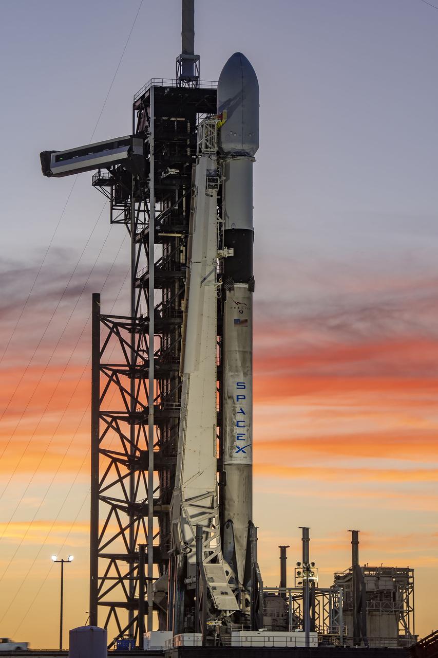 A SpaceX Falcon 9 rocket with NASA’s IMAP (Interstellar Mapping and Acceleration Probe), the agency’s Carruthers Geocorona Observatory, and National Oceanic and Atmospheric Administration’s (NOAA) Space Weather Follow On–Lagrange 1 (SWFO-L1) spacecraft atop stands vertical at Launch Complex 39A as the sun sets on Monday, Sept. 22, 2025, at the agency’s Kennedy Space Center in Florida. The missions will each focus on different effects of the solar wind — the continuous stream of particles emitted by the Sun — and space weather — the changing conditions in space driven by the Sun — from their origins at the Sun to their farthest reaches billions of miles away at the edge of our solar system.