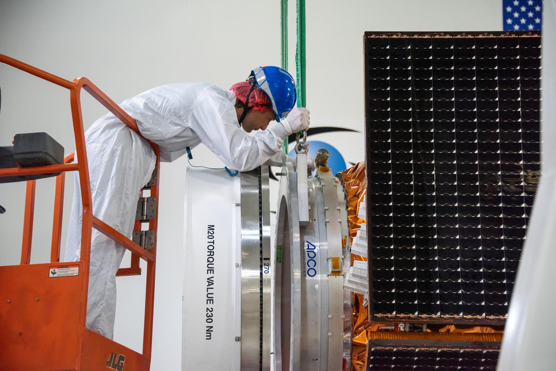 Technicians use a crane to place the Sentinel-6B spacecraft onto a work stand ahead of prelaunch operations at the Astrotech Space Operations payload processing facility at Vandenberg Space Force Base in California on Thursday, Sept. 25, 2025. Sentinel-6B will undergo detailed inspections, tests, and fueling in a cleanroom as it prepares for a November launch on a SpaceX Falcon 9 rocket. A collaboration between NASA, ESA (European Space Agency), EUMETSAT (European Organisation for the Exploitation of Meteorological Satellites), and the National Oceanic and Atmospheric Administration (NOAA), Sentinel-6B is designed to measure sea levels down to roughly an inch for about 90% of the world’s oceans and will extend out to a decade the record of atmospheric temperatures begun by Sentinel-6 Michael Freilich.