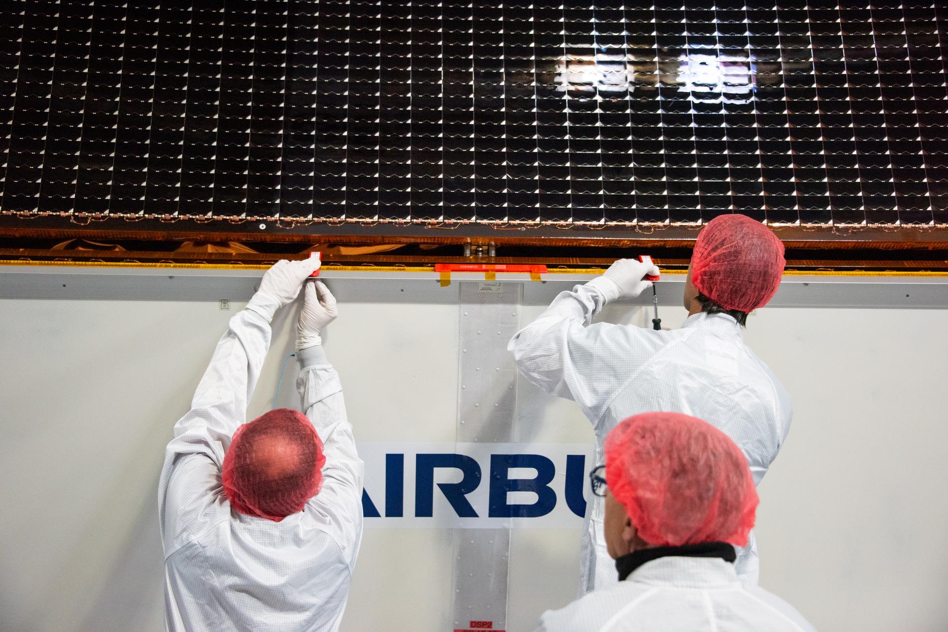 Technicians install protective solar array covers for the Sentinel-6B spacecraft inside the Astrotech Space Operations payload processing facility at Vandenberg Space Force Base in California on Friday, Sept. 26, 2025. Sentinel-6B will undergo detailed inspections, tests, and fueling in a cleanroom as it prepares for a November launch on a SpaceX Falcon 9 rocket. A collaboration between NASA, ESA (European Space Agency), EUMETSAT (European Organisation for the Exploitation of Meteorological Satellites), and the National Oceanic and Atmospheric Administration (NOAA), Sentinel-6B is designed to measure sea levels down to roughly an inch for about 90% of the world’s oceans and will extend out to a decade the record of atmospheric temperatures begun by Sentinel-6 Michael Freilich.