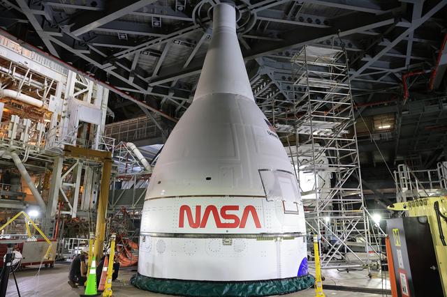 NASA’s Artemis II Orion spacecraft with its launch abort system is stacked at...