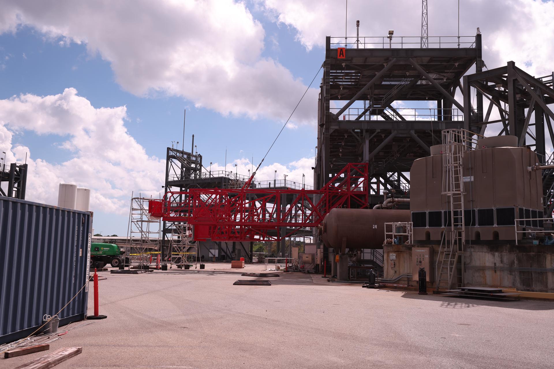 Crews test temporary contingency access platforms on the mobile launcher simulator tower on Wednesday, Oct. 29, 2025, at the Launch Equipment Test Facility at NASA’s Kennedy Space Center in Florida. The platforms will allow engineers to access the vehicle’s flight termination system on the rocket and the mobile launcher while at the pad rather than rolling back to the Vehicle Assembly Building to retest them. For Artemis II, four astronauts will venture around the Moon in early 2026, the first crewed mission on NASA’s path to establishing a long-term presence for science and exploration through Artemis.