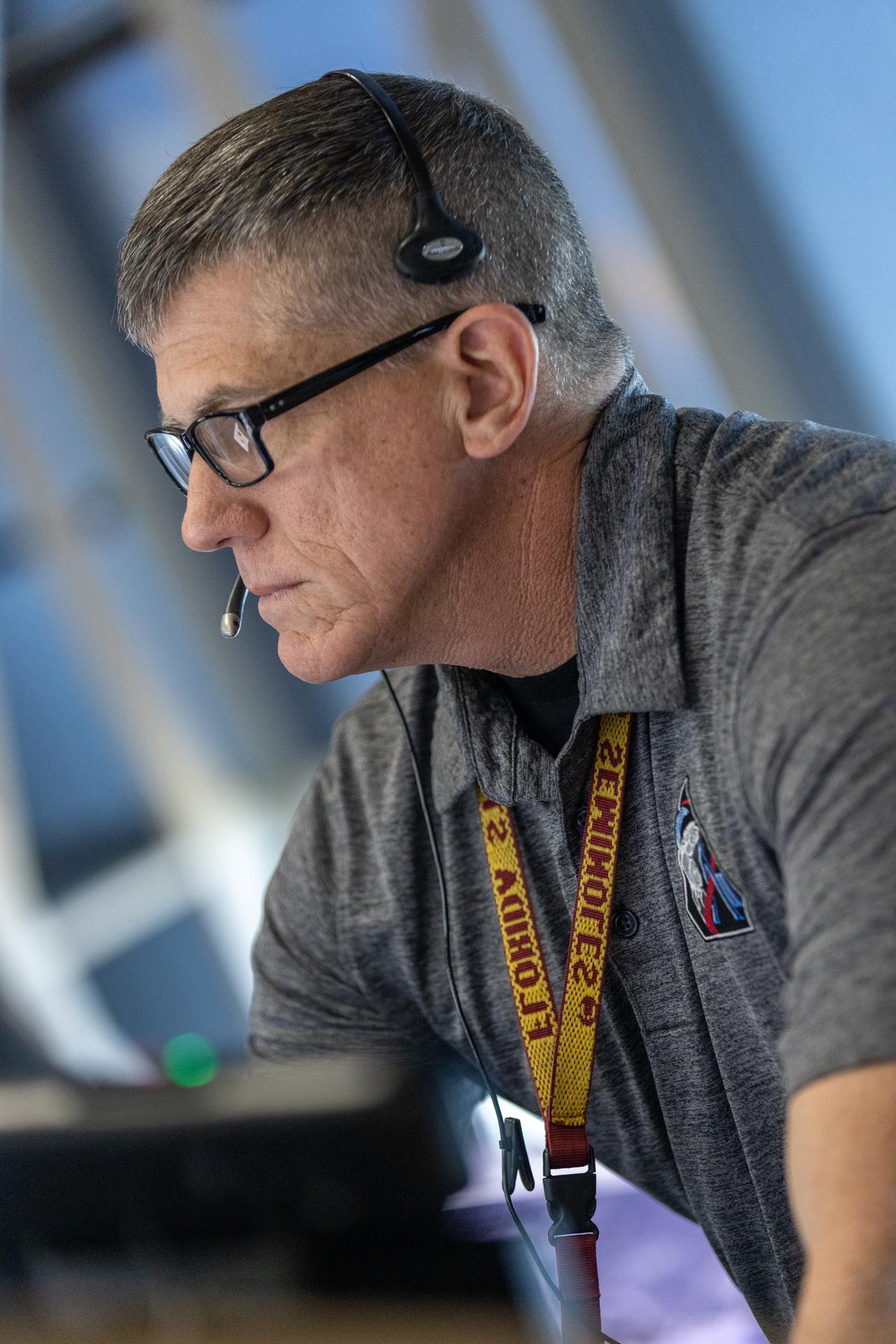 Jeremy Graeber, Artemis assistant launch director within NASA’s Exploration Ground Systems Program, participates in an Artemis II launch countdown simulation inside Firing Room 1 in the Launch Control Center at NASA’s Kennedy Space Center in Florida on Wednesday, Nov. 5, 2025. The simulations go through launch day scenarios to help launch team members test software and make adjustments if needed during countdown operations. For Artemis II, four astronauts will venture around the Moon, the first crewed mission on NASA’s path to establishing a long-term presence for science and exploration through Artemis.