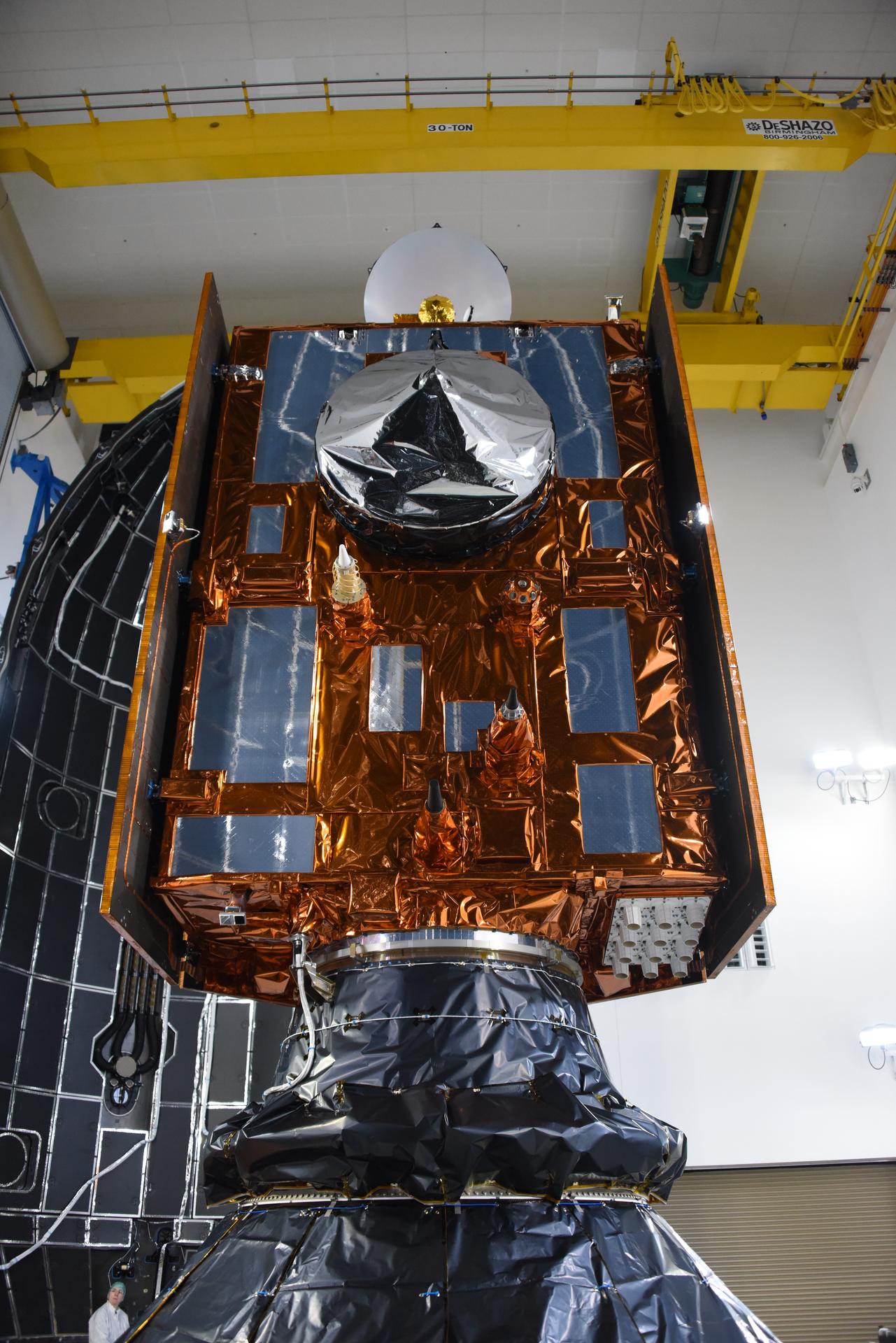 Technicians and engineers encapsulate the Sentinel-6B spacecraft within a protective payload fairing inside the Astrotech Space Operations facility at Vandenberg Space Force Base in California, on Monday, Nov. 10, 2025. A collaboration between NASA, ESA (European Space Agency), EUMETSAT (European Organisation for the Exploitation of Meteorological Satellites), and the National Oceanic and Atmospheric Administration (NOAA), Sentinel-6B is designed to measure sea levels down to roughly an inch for about 90% of the world’s oceans. NASA is targeting launch no earlier than Sunday, Nov. 16, on a SpaceX Falcon 9 rocket from Space Launch Complex 4 East at Vandenberg.
