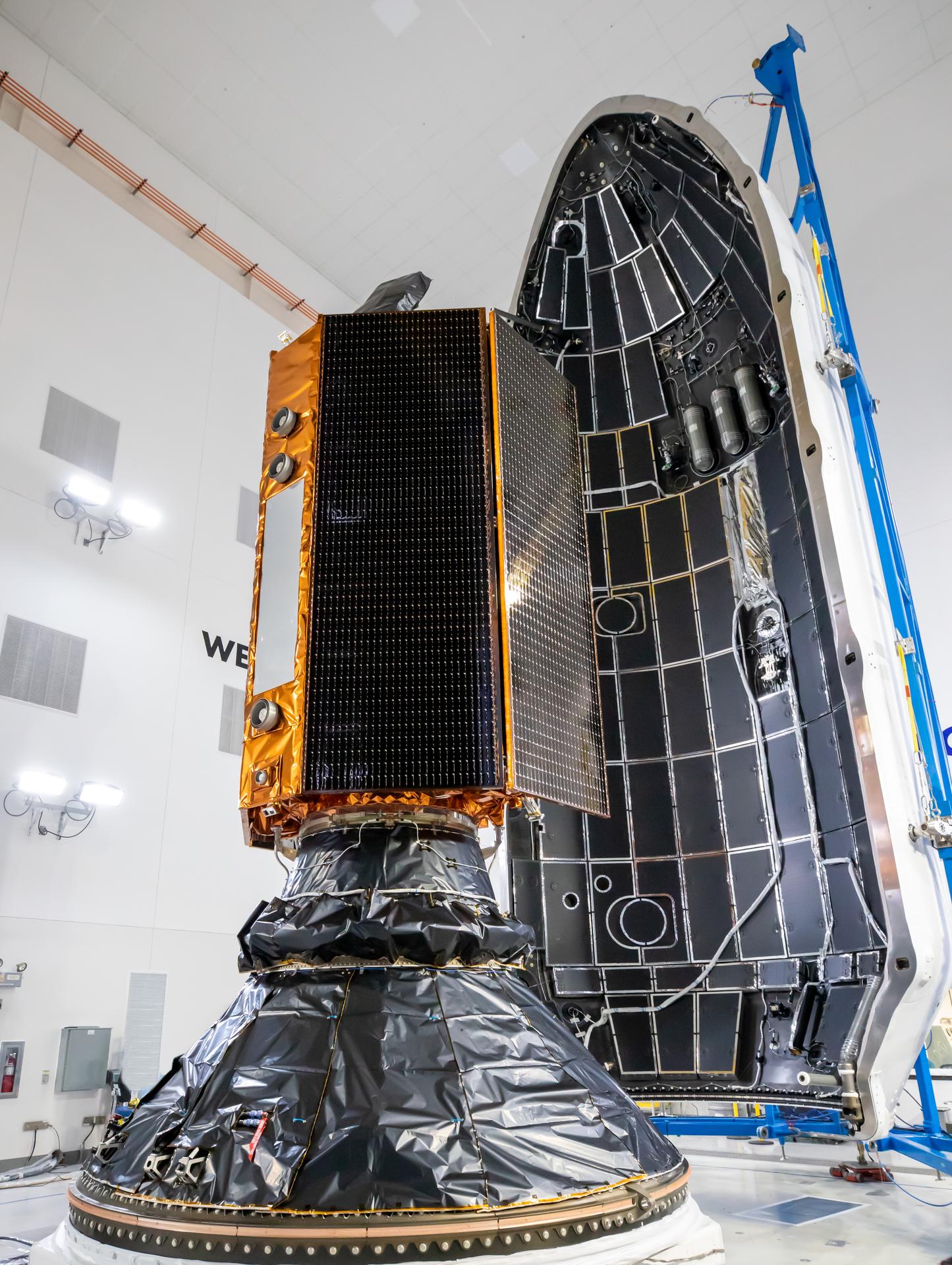 Technicians and engineers encapsulate the Sentinel-6B spacecraft within a protective payload fairing inside the Astrotech Space Operations facility at Vandenberg Space Force Base in California, on Monday, Nov. 10, 2025. A collaboration between NASA, ESA (European Space Agency), EUMETSAT (European Organisation for the Exploitation of Meteorological Satellites), and the National Oceanic and Atmospheric Administration (NOAA), Sentinel-6B is designed to measure sea levels down to roughly an inch for about 90% of the world’s oceans. NASA is targeting launch no earlier than Sunday, Nov. 16, on a SpaceX Falcon 9 rocket from Space Launch Complex 4 East at Vandenberg.