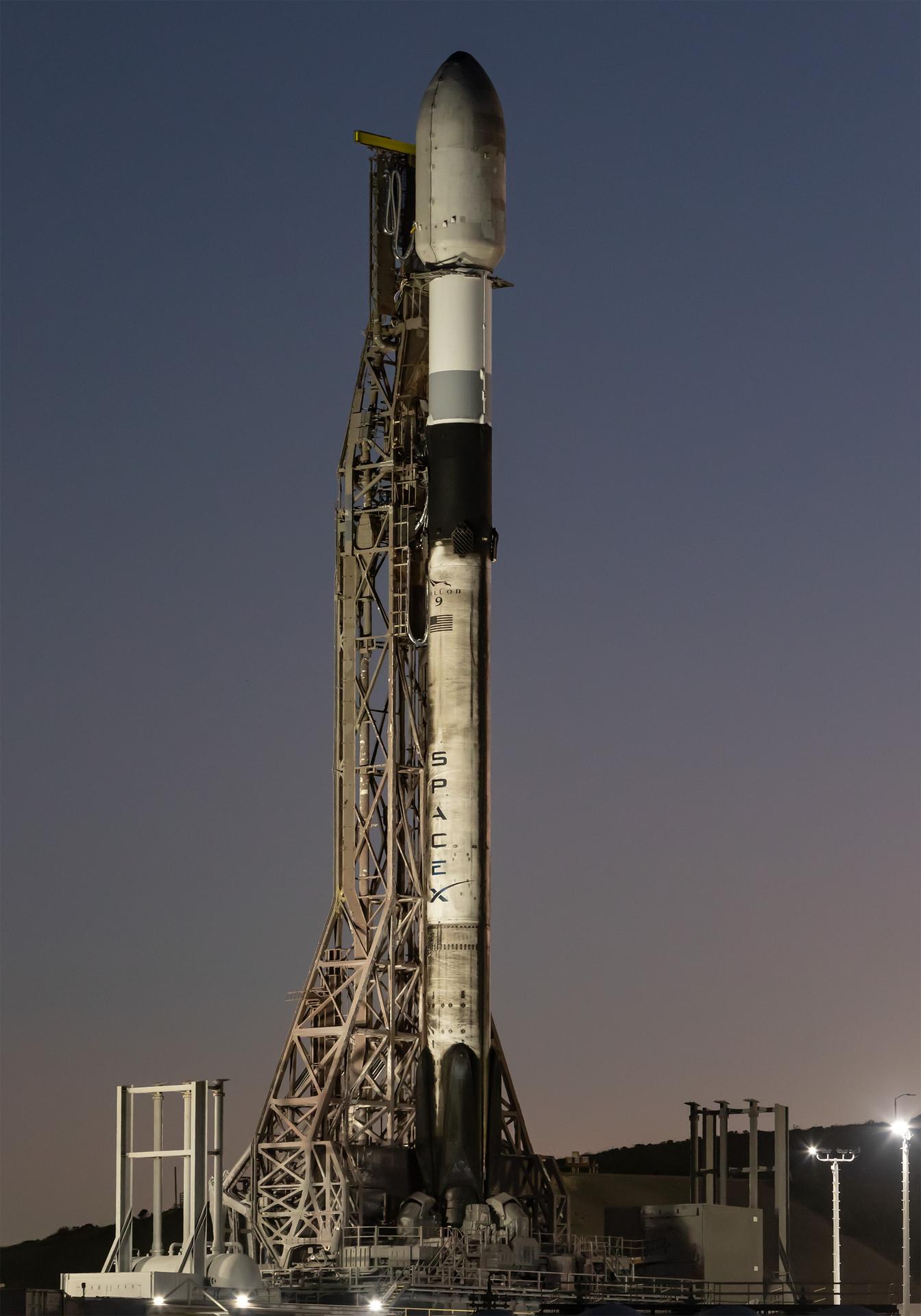 A SpaceX Falcon 9 rocket carrying NASA’s R5-S7 (Realizing Rapid, Reduced-cost high-Risk Research project Spacecraft 7) CubeSat along with several other satellites as part of the company’s Transporter-15 mission stands vertical on the launch pad of Space Launch Complex 4 East at Vandenberg Space Force Base in California on Wednesday, Nov. 26, 2025. The latest in a series of spacecraft, R5-S7 will explore ways to get multiple technology prototypes into low Earth orbit rapidly and at a low cost, accelerating the demonstration of these technologies in orbit and allowing engineers and scientists to more quickly prove them and make them available to NASA missions and other users.