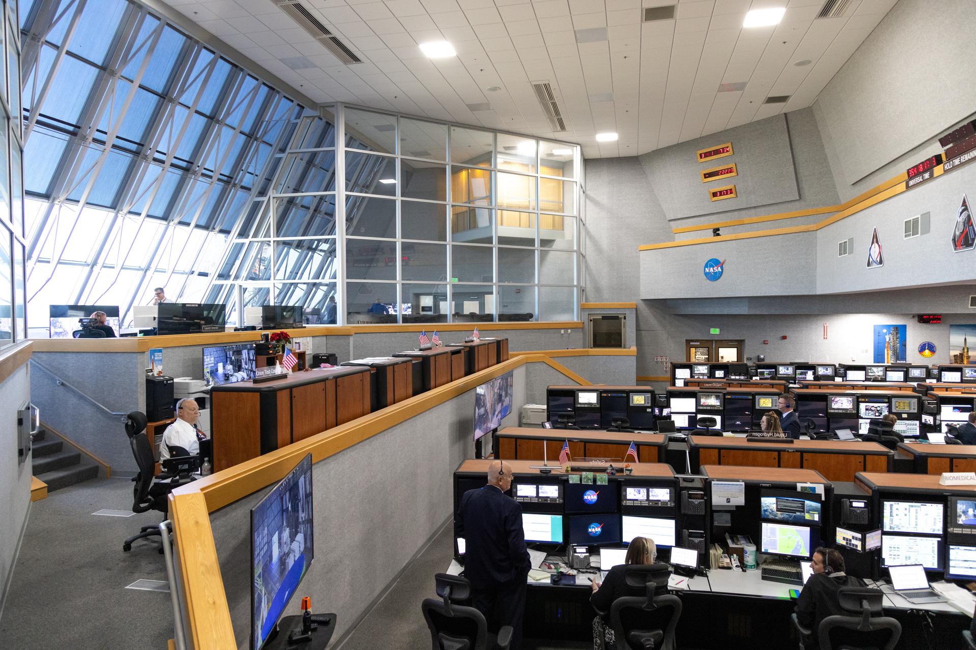 Teams monitor the progress of a countdown demonstration test with Artemis II crewmembers NASA astronauts Reid Wiseman, commander; Victor Glover, pilot; Christina Koch, mission specialist; and CSA (Canadian Space Agency) astronaut Jeremy Hansen, mission specialist onboard their Orion spacecraft from Firing Room 1 of the Rocco A. Petrone Launch Control Center, Saturday, Dec. 20, 2025, at NASA’s Kennedy Space Center in Florida. For this operation, the Artemis II crew and launch teams are simulating the launch day timeline including suit-up, walkout, and spacecraft ingress and egress. Through the Artemis campaign, NASA will send astronauts to explore the Moon for scientific discovery, economic benefits, and to build the foundation for the first crewed missions to Mars, for the benefit of all.