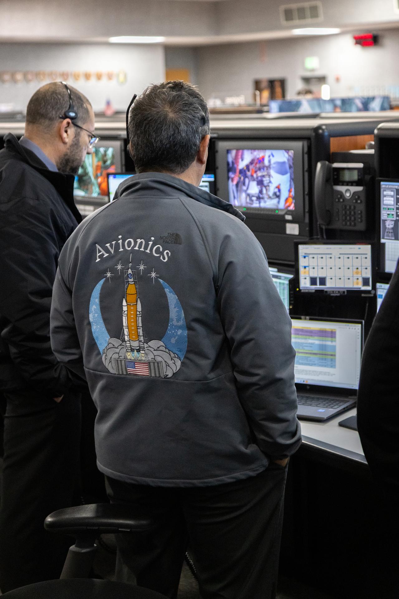 Teams monitor the progress of a countdown demonstration test with Artemis II crewmembers NASA astronauts Reid Wiseman, commander; Victor Glover, pilot; Christina Koch, mission specialist; and CSA (Canadian Space Agency) astronaut Jeremy Hansen, mission specialist onboard their Orion spacecraft from Firing Room 1 of the Rocco A. Petrone Launch Control Center, Saturday, Dec. 20, 2025, at NASA’s Kennedy Space Center in Florida. For this operation, the Artemis II crew and launch teams are simulating the launch day timeline including suit-up, walkout, and spacecraft ingress and egress. Through the Artemis campaign, NASA will send astronauts to explore the Moon for scientific discovery, economic benefits, and to build the foundation for the first crewed missions to Mars, for the benefit of all.