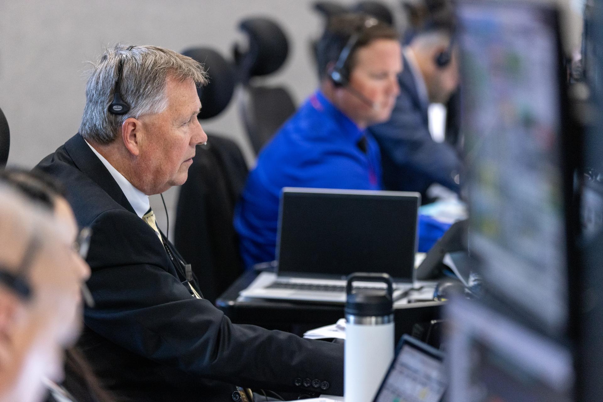 From left, Jeff Spaulding, senior NASA test director, and Wes Mosedale, NASA test director, monitor the progress of a countdown demonstration test with Artemis II crewmembers NASA astronauts Reid Wiseman, commander; Victor Glover, pilot; Christina Koch, mission specialist; and CSA (Canadian Space Agency) astronaut Jeremy Hansen, mission specialist onboard their Orion spacecraft from Firing Room 1 of the Rocco A. Petrone Launch Control Center, Saturday, Dec. 20, 2025, at NASA’s Kennedy Space Center in Florida. For this operation, the Artemis II crew and launch teams are simulating the launch day timeline including suit-up, walkout, and spacecraft ingress and egress. Through the Artemis campaign, NASA will send astronauts to explore the Moon for scientific discovery, economic benefits, and to build the foundation for the first crewed missions to Mars, for the benefit of all.