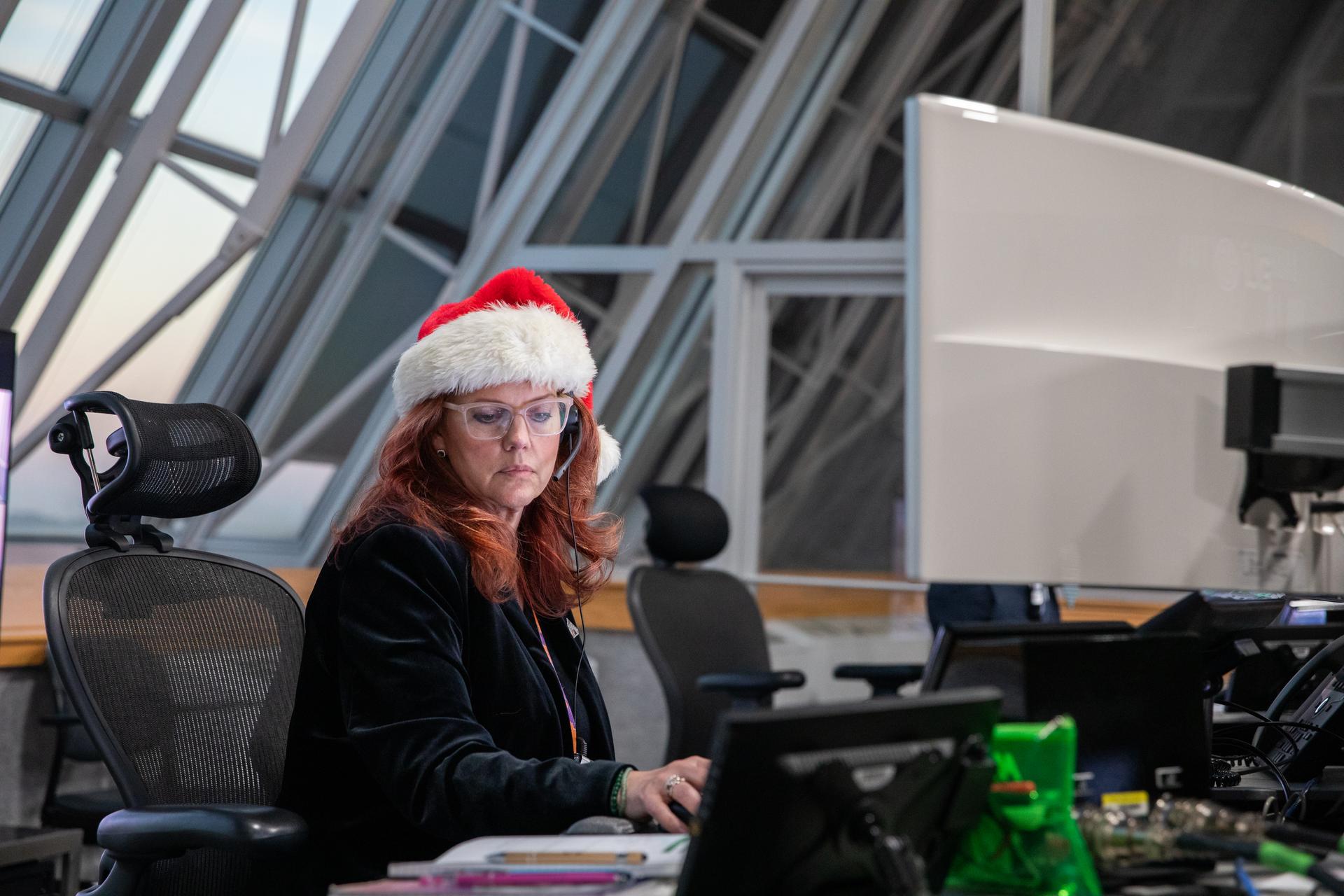 Charlie Blackwell-Thompson, Artemis launch director, monitors the progress of a countdown demonstration test with Artemis II crewmembers NASA astronauts Reid Wiseman, commander; Victor Glover, pilot; Christina Koch, mission specialist; and CSA (Canadian Space Agency) astronaut Jeremy Hansen, mission specialist onboard their Orion spacecraft from Firing Room 1 of the Rocco A. Petrone Launch Control Center, Saturday, Dec. 20, 2025, at NASA’s Kennedy Space Center in Florida. For this operation, the Artemis II crew and launch teams are simulating the launch day timeline including suit-up, walkout, and spacecraft ingress and egress. Through the Artemis campaign, NASA will send astronauts to explore the Moon for scientific discovery, economic benefits, and to build the foundation for the first crewed missions to Mars, for the benefit of all.