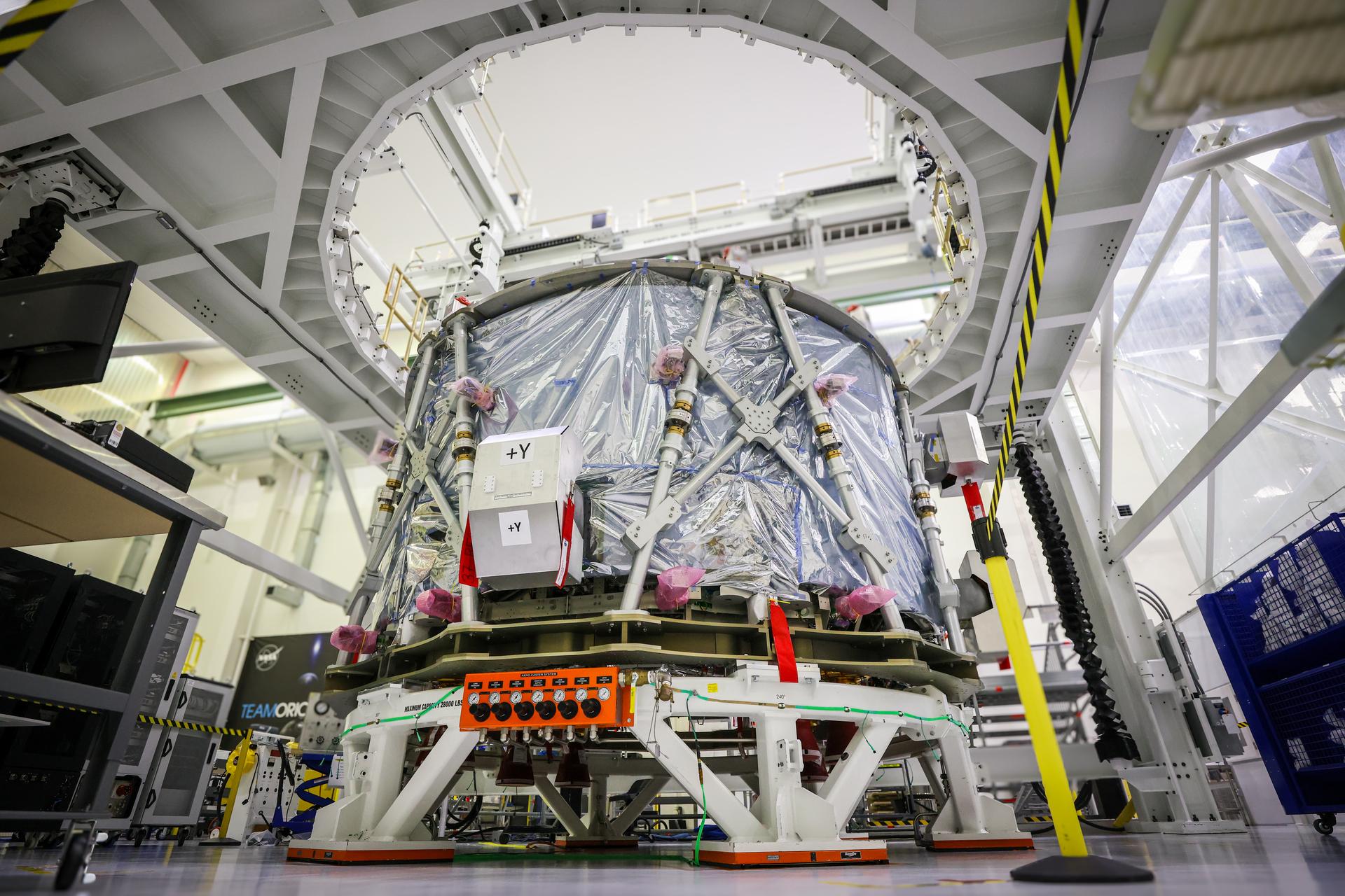 The transport carrier containing the European Service Module for NASA’s Artemis IV mission arrives at the Neil A. Armstrong Operations and Checkout Building at NASA’s Kennedy Space Center in Florida on Saturday, Dec. 20, 2025. The European Service Module, which is assembled by Airbus in Bremen, Germany, from parts made in 10 European countries and the United States, acts as the driving force behind Orion for deep space exploration, providing essential propulsion, thermal control, and electrical power.
