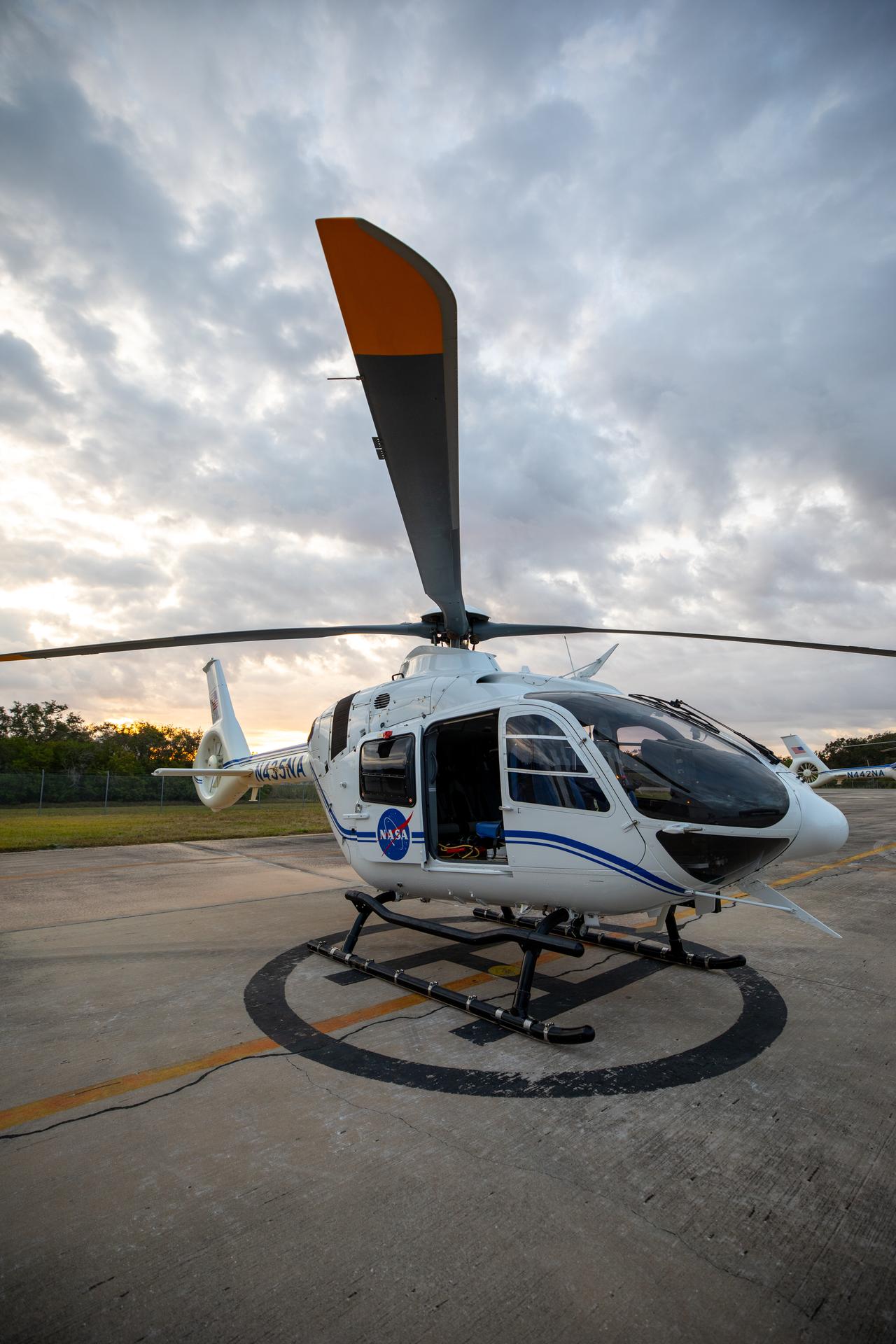 NASA Airbus H135 (T3) helicopters prepare for takeoff from the Launch and Landing Facility at the agency’s Kennedy Space Center in Florida carrying NASA Administrator Jared Isaacman and NASA Kennedy leadership on Tuesday, Jan. 13, 2026. Isaacman, NASA’s 15th administrator, began visiting the agency’s centers after his appointment on Dec. 17, 2025, to meet with employees, contractors, and partners.