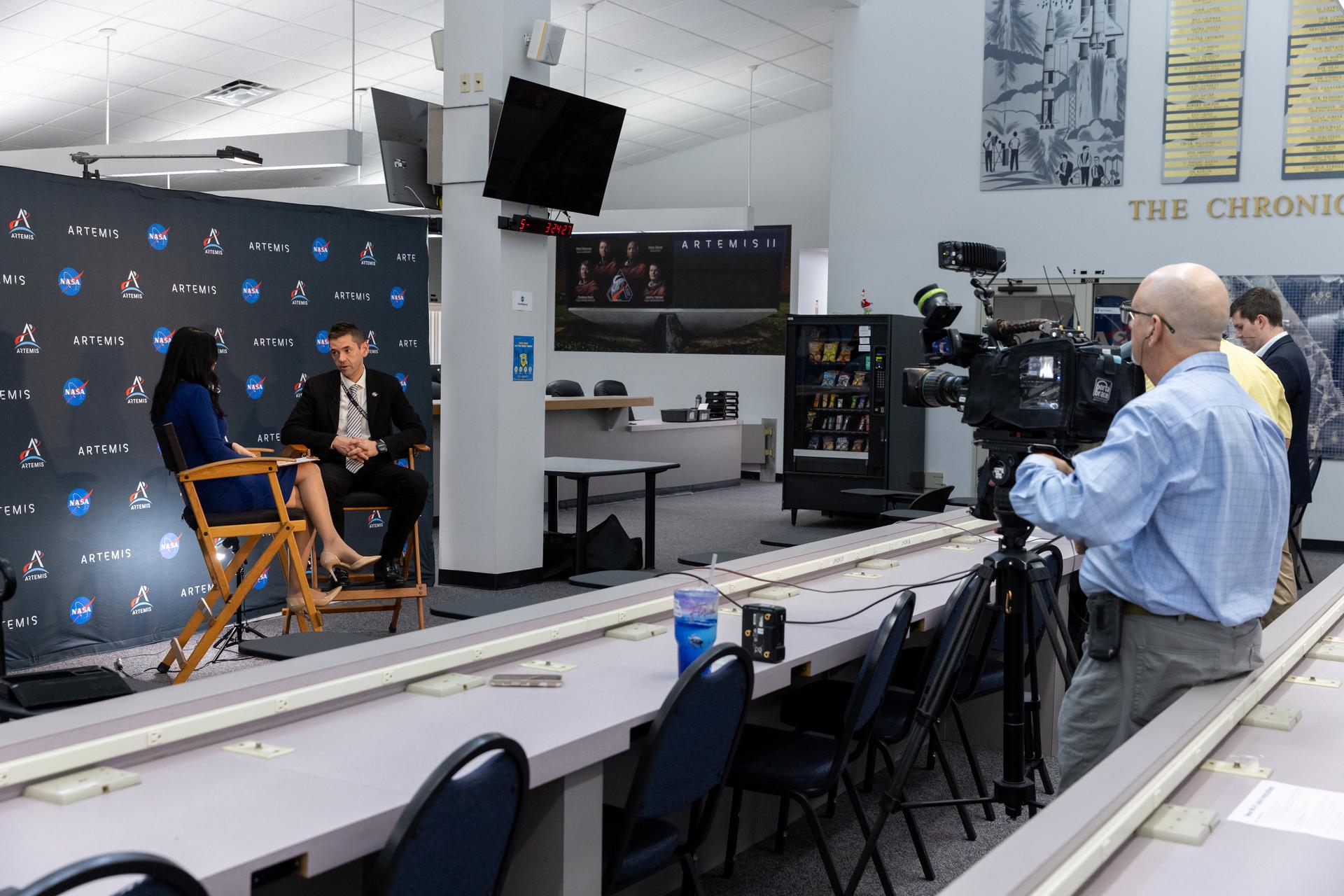 NASA Administrator Jared Isaacman speaks to a member of the media on Tuesday, Jan. 13, 2026, at the NASA News Center at the agency’s Kennedy Space Center in Florida. The newly appointed 15th administrator of the agency outlined his vision for his term including sending humans to the Moon and beyond. 