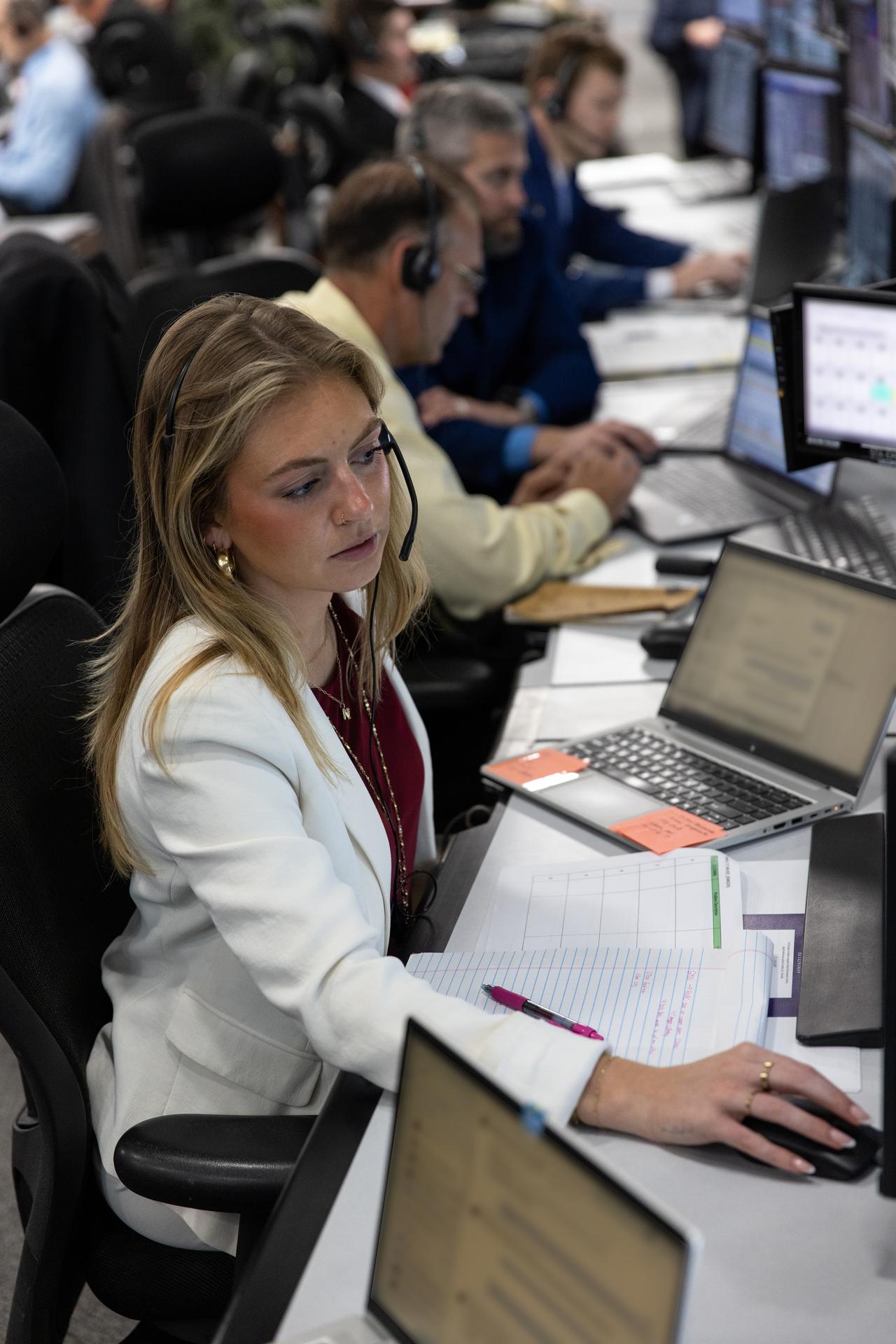 Madison Schmaltz, Artemis launch team member, participates in the Artemis II terminal count simulation on Wednesday, Jan. 14, 2026, inside Firing Room 1 of the Rocco A. Petrone Launch Control Center at NASA’s Kennedy Space Center in Florida. The terminal count simulation conducted by NASA’s Exploration Ground Systems team runs through the final five hours of launch countdown, include terminal count - the remaining 10 minutes of the countdown - for NASA’s Artemis II test flight which will take Commander Reid Wiseman, Pilot Victor Glover, and Mission Specialist Christina Koch from NASA, and Mission Specialist Jeremy Hansen from the CSA (Canadian Space Agency), around the Moon and back to Earth no later than no later than April 2026 from Launch Complex 39B at NASA Kennedy.