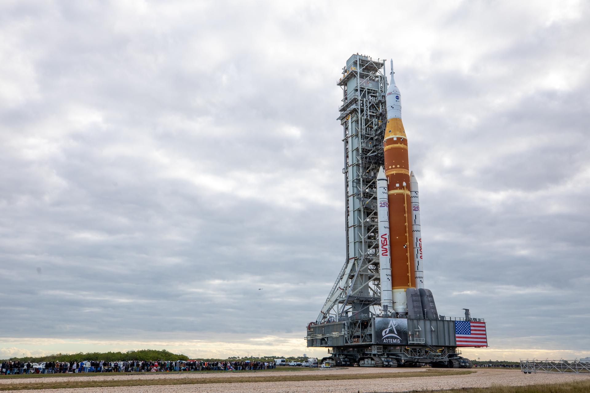 NASA’s crawler-transporter 2 carrying the agency’s Artemis II SLS (Space Launch System) rocket and Orion spacecraft, secured to the mobile launcher, begins the 4.2-mile journey toward Launch Complex 39B at NASA’s Kennedy Space Center in Florida on Saturday, Jan. 17, 2026. The Artemis II test flight will take Commander Reid Wiseman, Pilot Victor Glover, and Mission Specialist Christina Koch from NASA, and Mission Specialist Jeremy Hansen from the CSA (Canadian Space Agency), around the Moon and back to Earth no later than April 2026.