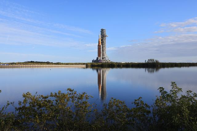 NASA’s crawler-transporter 2 carrying the agency’s Artemis II SLS (Space Laun...