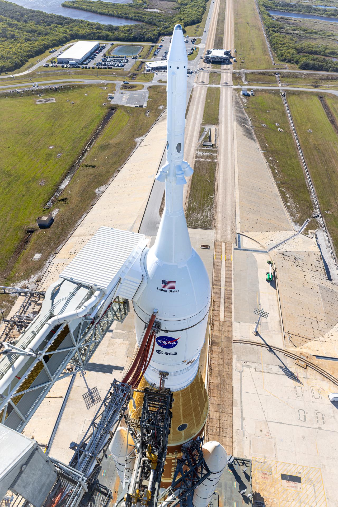 A closeup view of the crew access arm connected to NASA’s Orion spacecraft with the launch abort system atop NASA’s Artemis II SLS (Space Launch System) rocket at Launch Complex 39B at NASA’s Kennedy Space Center in Florida on Tuesday, Jan. 20, 2026. The Artemis II test flight will take Commander Reid Wiseman, Pilot Victor Glover, and Mission Specialist Christina Koch from NASA, and Mission Specialist Jeremy Hansen from the CSA (Canadian Space Agency), on a 10-day journey no earlier than 6:24 p.m. EDT on Wednesday, April 1. 