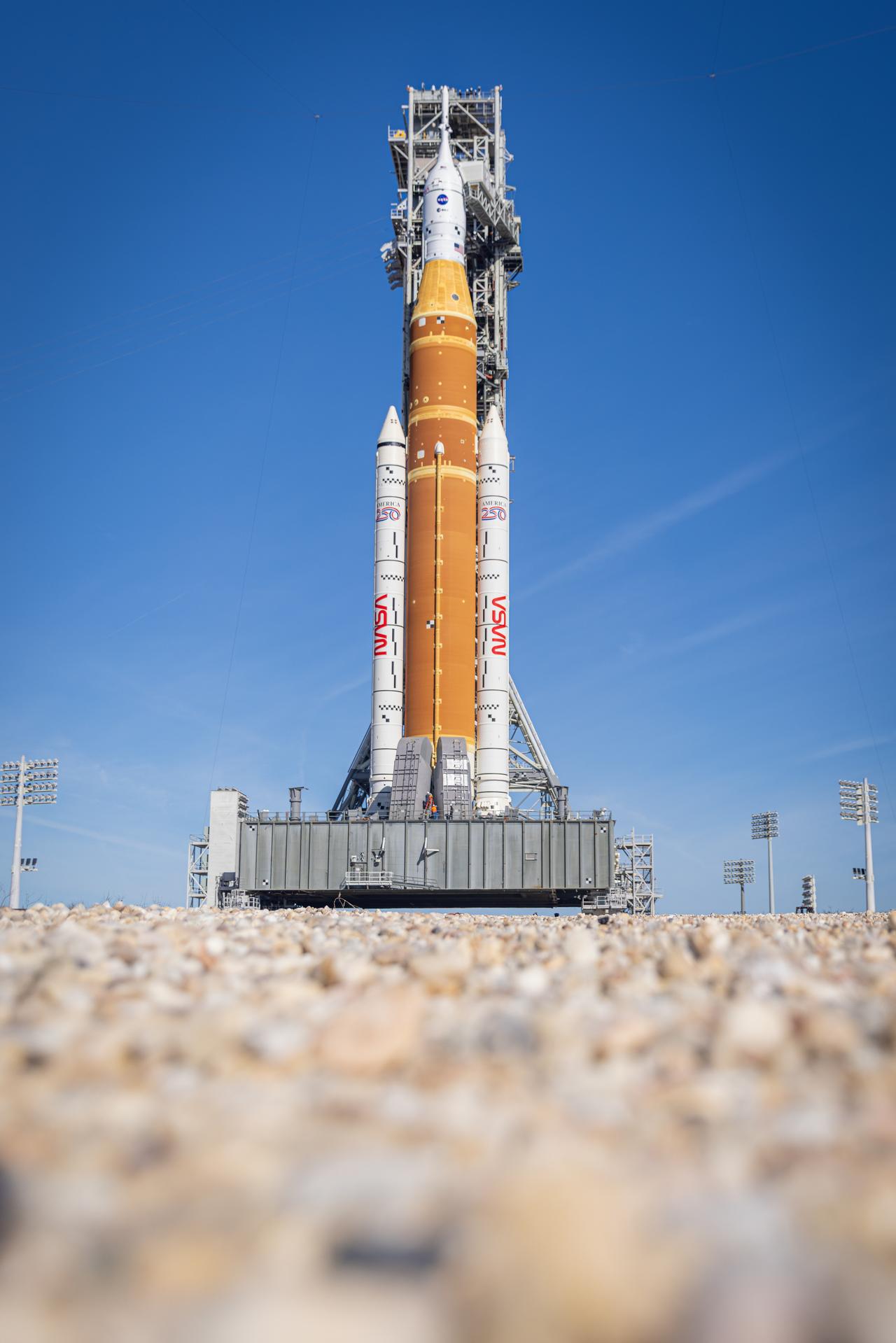 NASA’s Artemis II SLS (Space Launch System) rocket and Orion spacecraft, secured to the mobile launcher, stands vertical at Launch Complex 39B at NASA’s Kennedy Space Center in Florida on Tuesday, Jan. 20, 2026. The Artemis II test flight will take Commander Reid Wiseman, Pilot Victor Glover, and Mission Specialist Christina Koch from NASA, and Mission Specialist Jeremy Hansen from the CSA (Canadian Space Agency), on a 10-day journey no earlier than 6:24 p.m. EDT on Wednesday, April 1. 