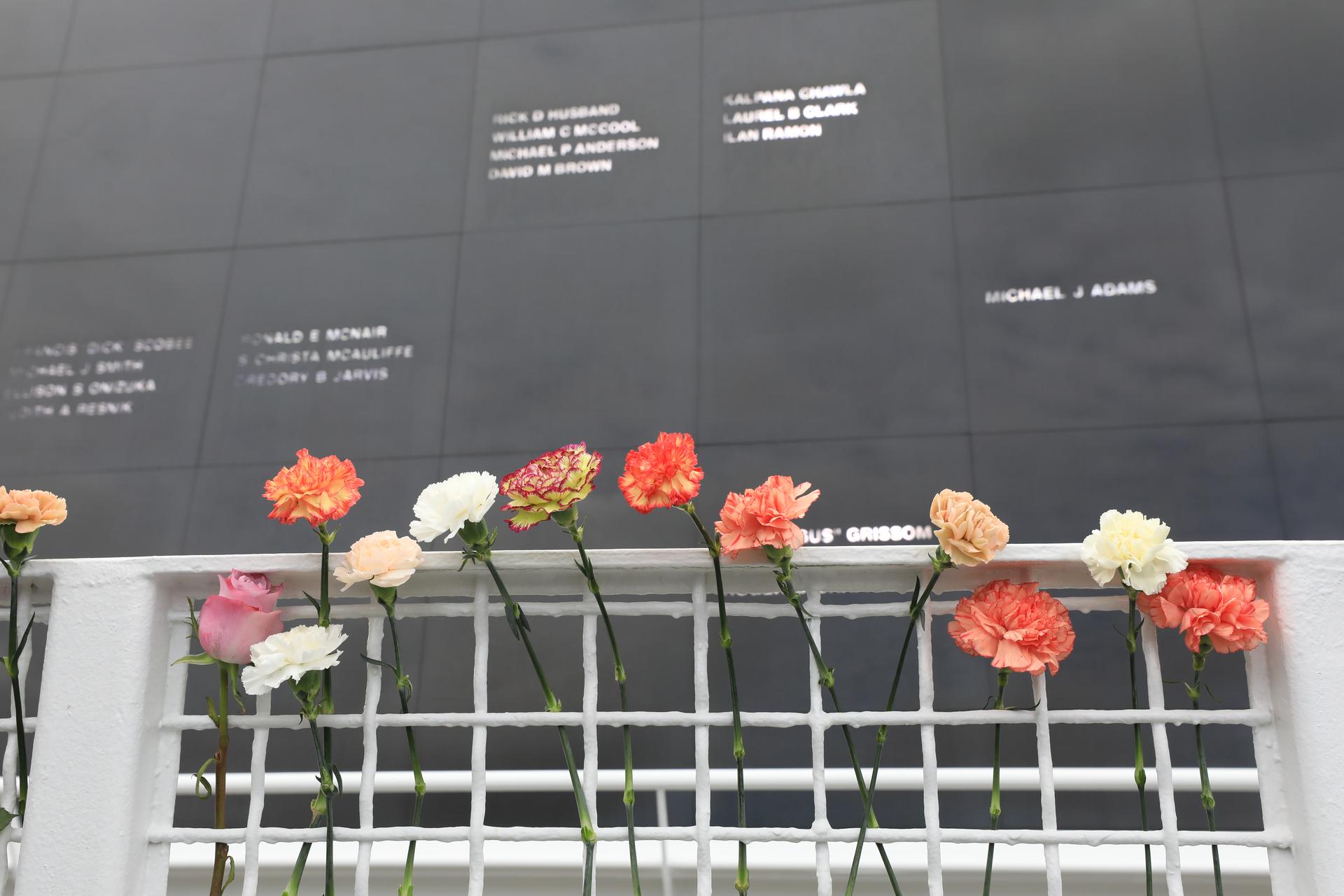 NASA’s Day of Remembrance is marked by flowers placed before the Space Mirror Memorial at the Kennedy Space Center Visitor Complex in Florida on Thursday, Jan. 22, 2026. The mirror was dedicated in 1991 to honor all astronauts who lost their lives on missions or during training. During the Day of Remembrance, NASA centers across the country honor those astronauts who have fallen in the pursuit of space exploration. This year marks the 40th anniversary of the Challenger tragedy.