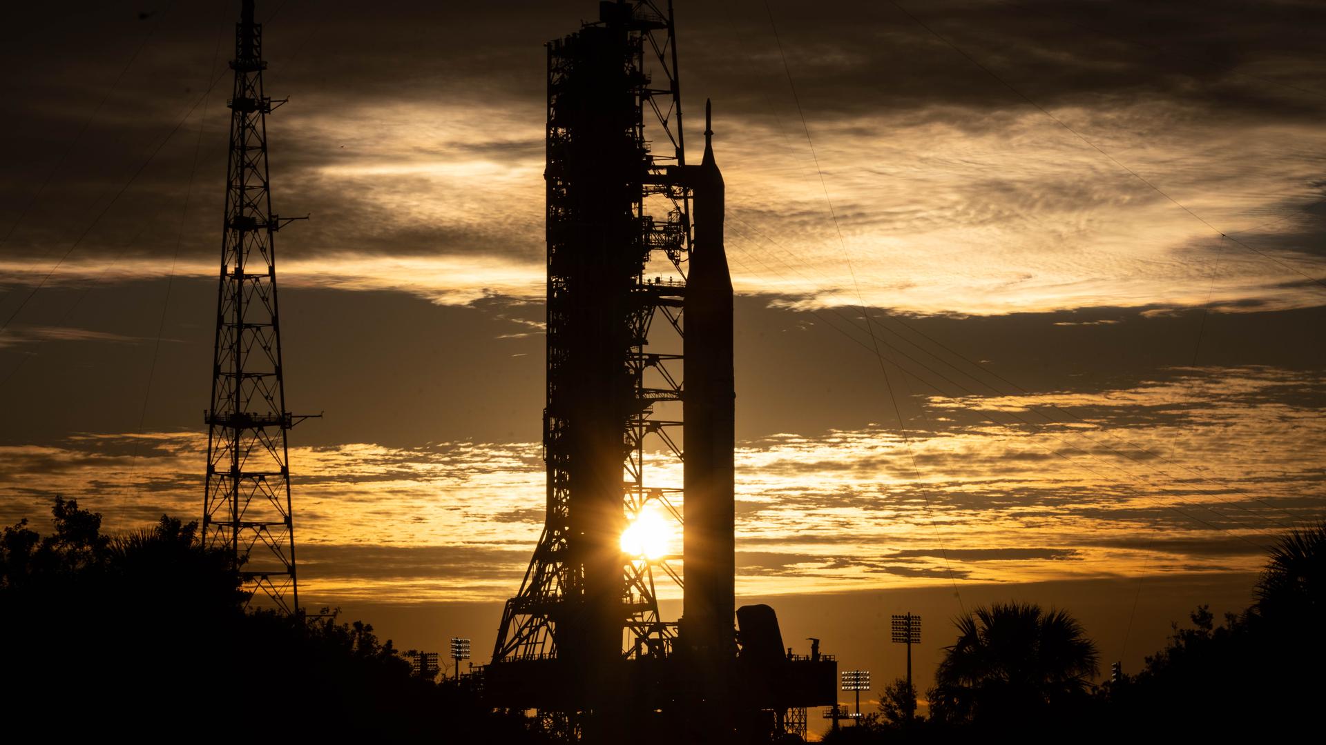 The Sun rises as NASA’s Artemis II SLS (Space Launch System) rocket and Orion spacecraft stand vertical at Launch Complex 39B at NASA’s Kennedy Space Center in Florida on Wednesday, Jan. 28, 2026. The Artemis II test flight will take Commander Reid Wiseman, Pilot Victor Glover, and Mission Specialist Christina Koch from NASA and Mission Specialist Jeremy Hansen from the CSA (Canadian Space Agency), around the Moon and back to Earth no later than April 2026.