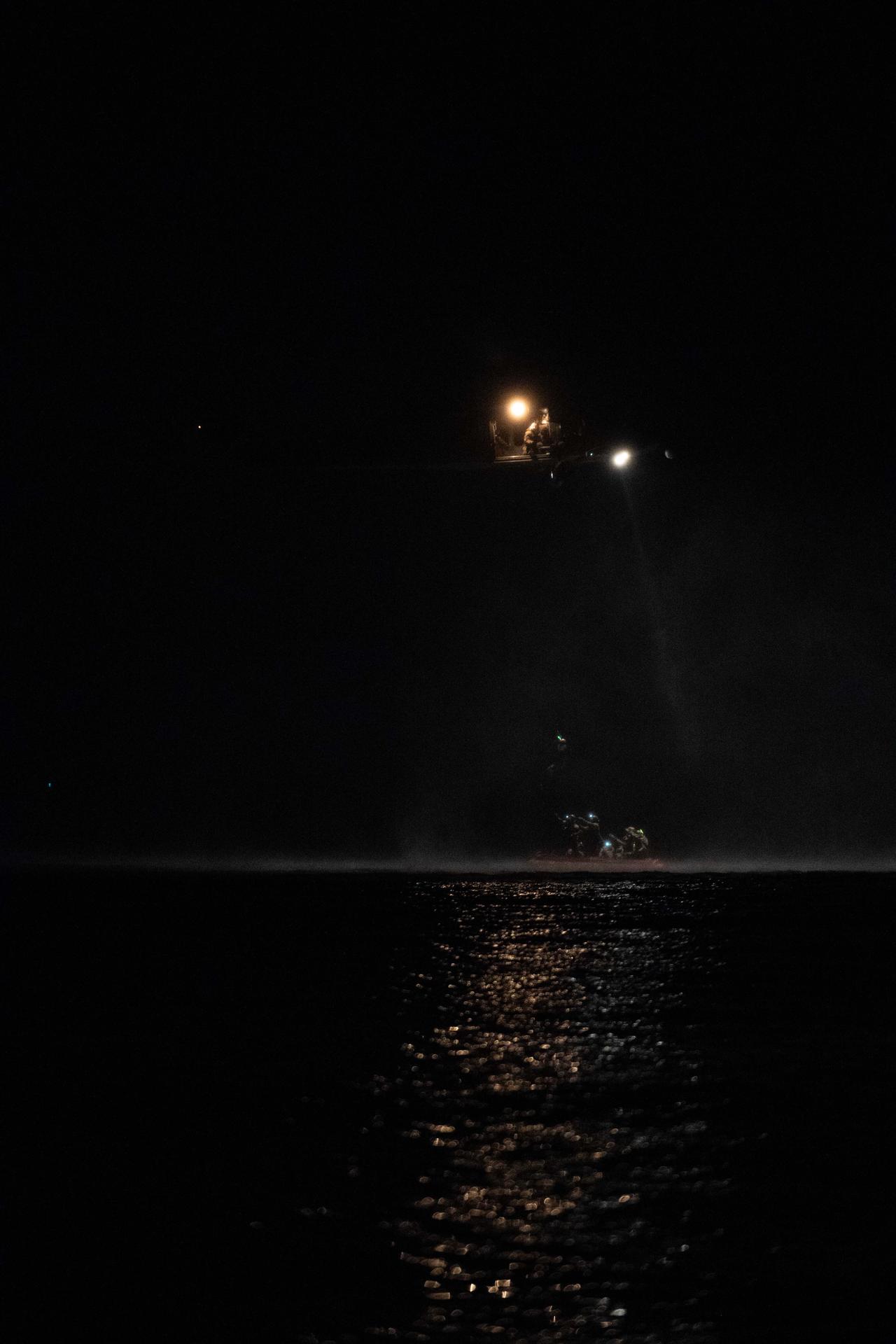 Members from NASA’s Artemis Landing and Recovery team and the Department of War perform a final simulation of the Artemis II splashdown, called a just-in-time training, in the Pacific Ocean off the coast of California on Thursday, Jan. 29, 2026. The teams will work together to retrieve the Artemis II crew and Orion spacecraft following their return to Earth, and during the training the teams use the Crew Module Test Article, a full-scale mockup of the Orion spacecraft, to simulate as close as possible the conditions they can expect to encounter during splashdown of the Artemis II mission. NASA’s first crewed test flight in the Artemis campaign, the approximately 10-day Artemis II mission will send NASA astronauts Reid Wiseman, Victor Glover, and Christina Koch, and CSA (Canadian Space Agency) astronaut Jeremy Hansen around the Moon and farther than any humans have ever been from Earth.