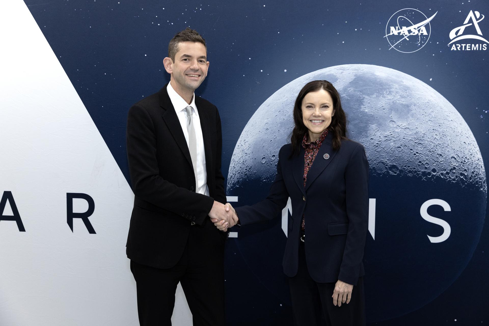 From left, NASA Administrator Jared Isaacman and CSA (Canadian Space Agency) President Lisa Campbell pose for a photograph during Artemis II wet dress rehearsal on Monday, Feb. 2, 2026, at NASA’s Kennedy Space Center in Florida. The wet dress rehearsal allows the Artemis II launch team to run through operations to load propellant, conduct a full launch countdown, demonstrate the ability to recycle the countdown clock, and drain the tanks to practice timelines and procedures for launch. The Artemis II test flight will take Commander Reid Wiseman, Pilot Victor Glover, and Mission Specialist Christina Koch from NASA, and Mission Specialist Jeremy Hansen from the CSA, around the Moon and back to Earth from Launch Complex 39B at NASA Kennedy.