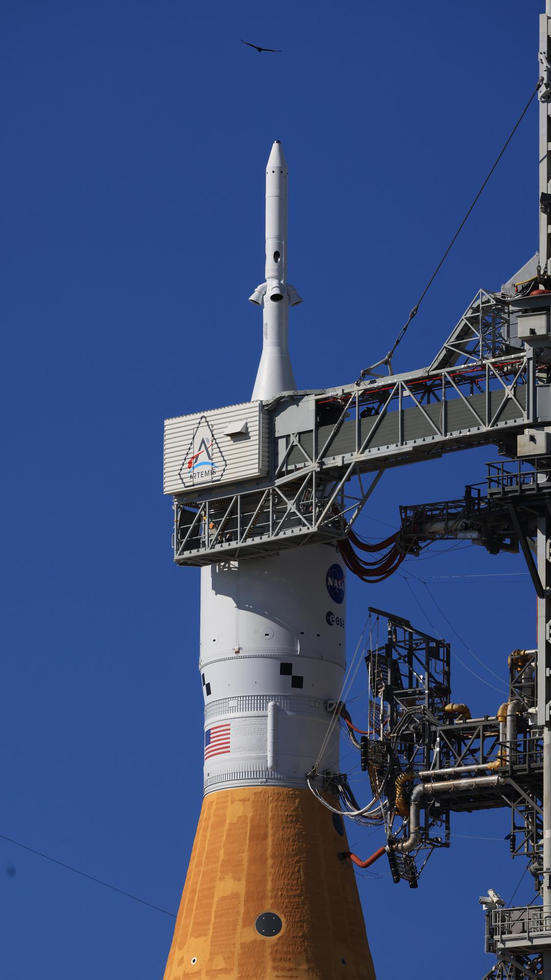 A photo shows a closeup view of the White Room connected to the crew access arm of the Orion spacecraft with launch abort system atop NASA’s Artemis II SLS (Space Launch System) rocket at Launch Complex 39B at NASA’s Kennedy Space Center in Florida on Tuesday, Feb. 10, 2026. The White Room is the small, environmentally controlled area where Artemis II Commander Reid Wiseman, Pilot Victor Glover, and Mission Specialist Christina Koch from NASA, and Mission Specialist Jeremy Hansen from the CSA (Canadian Space Agency) will make final preparations before climbing into the Orion spacecraft for launch of the Artemis II test flight.