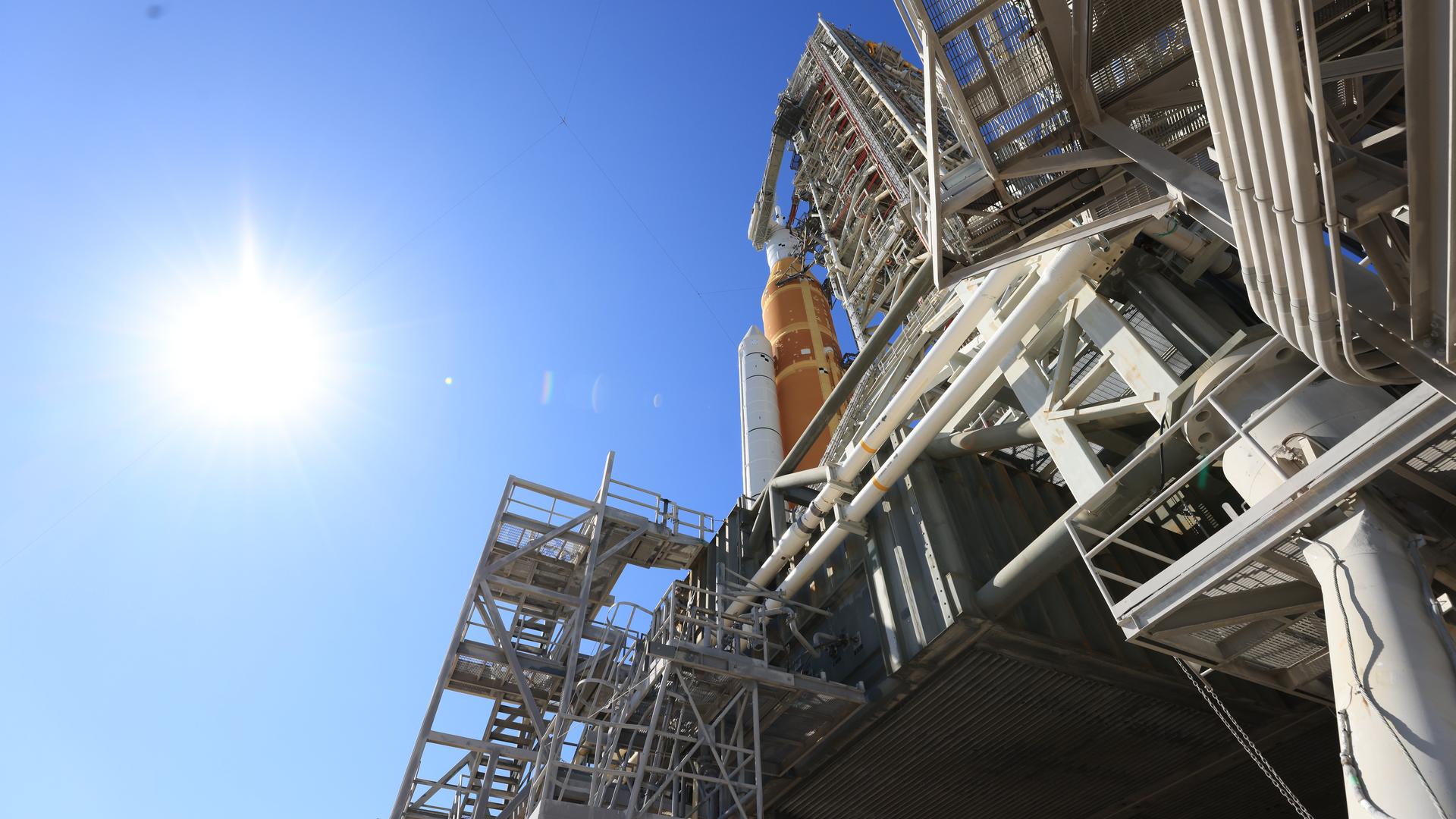 A side view shows one of the twin SLS (Space Launch System) solid rocket boosters, core stage, Orion spacecraft, and launch abort system of NASA’s Artemis II rocket at Launch Complex 39B at NASA’s Kennedy Space Center in Florida on Tuesday, Feb. 10, 2026. The Artemis II test flight will take Commander Reid Wiseman, Pilot Victor Glover, and Mission Specialist Christina Koch from NASA, and Mission Specialist Jeremy Hansen from the CSA (Canadian Space Agency), around the Moon and back to Earth.