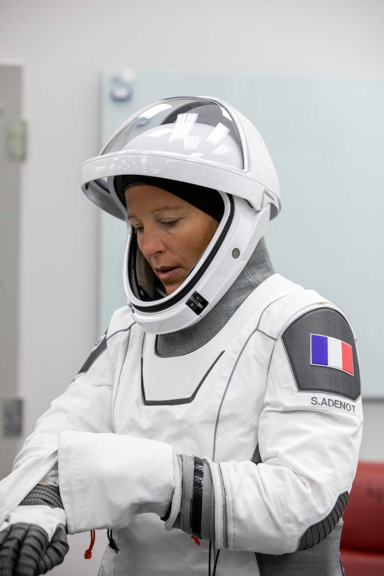 ESA (European Space Agency) astronaut Sophie Adenot conducts leak checks on her SpaceX spacesuit inside the crew suit-up room in the Neil A. Armstrong Operations and Checkout Building at the agency’s Kennedy Space Center in Florida ahead of launch of NASA’s SpaceX Crew-12 mission to the International Space Station on Friday, Feb. 13, 2026. Adenot, NASA astronauts Jessica Meir and Jack Hathaway, and Roscosmos cosmonaut Andrey Fedyaev are scheduled to lift off aboard SpaceX’s Dragon spacecraft and Falcon 9 rocket at 5:15 a.m. EST, from Space Launch Complex 40 at Cape Canaveral Space Force Station in Florida.