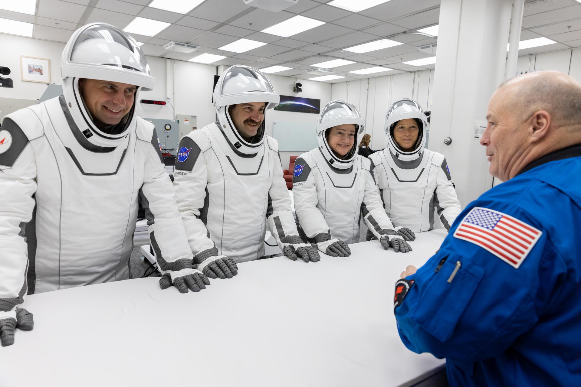 NASA’s SpaceX Crew-12 crew members play the traditional card game with NASA astronaut Scott Tingle, inside the Neil A. Armstrong Operations and Checkout Building at the agency’s Kennedy Space Center in Florida ahead of launch to the International Space Station on Friday, Feb. 13, 2026. From left, Roscosmos cosmonaut Andrey Fedyaev, NASA astronauts Jack Hathaway and Jessica Meir, and ESA (European Space Agency) astronaut Sophie Adenot are scheduled to lift off aboard SpaceX’s Dragon spacecraft and Falcon 9 rocket at 5:15 a.m. EST, from Space Launch Complex 40 at Cape Canaveral Space Force Station in Florida.