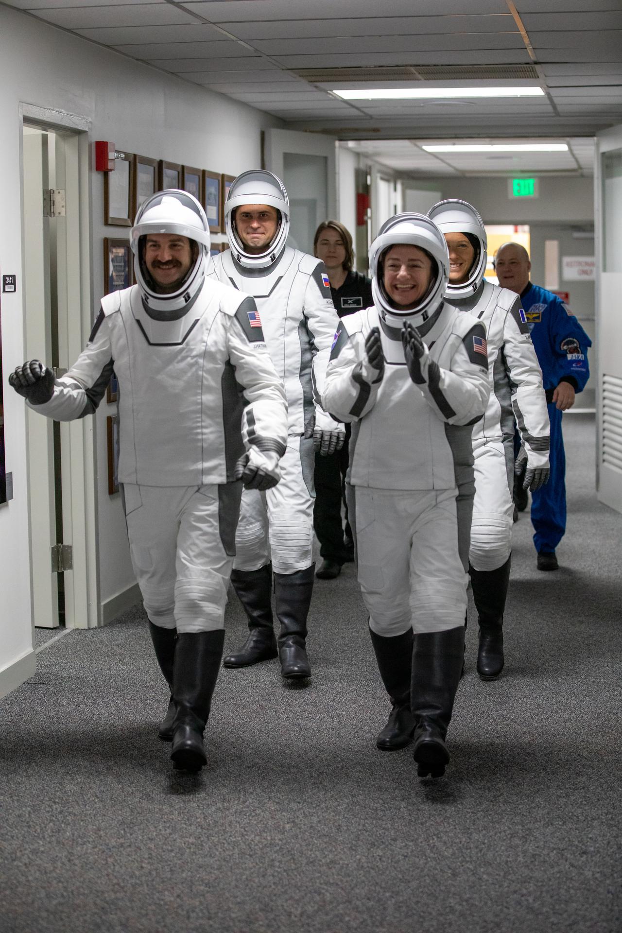 NASA’s SpaceX Crew-12 crew members prepare to walk out of the Neil A. Armstrong Operations and Checkout Building at the agency’s Kennedy Space Center in Florida for nearby Space Launch Complex 40 at Cape Canaveral Space Force Station for launch of Crew-12 on Friday, Feb. 13, 2026. NASA astronauts Jack Hathaway (front, left) and Jessica Meir (right) are followed by Roscosmos cosmonaut Andrey Fedyaev (back, left) and ESA (European Space Agency) astronaut Sophie Adenot as they wave to family and friends as they depart. Crew-12 is scheduled to lift off aboard SpaceX’s Dragon spacecraft and Falcon 9 rocket to the International Space Station at 5:15 a.m. EST.