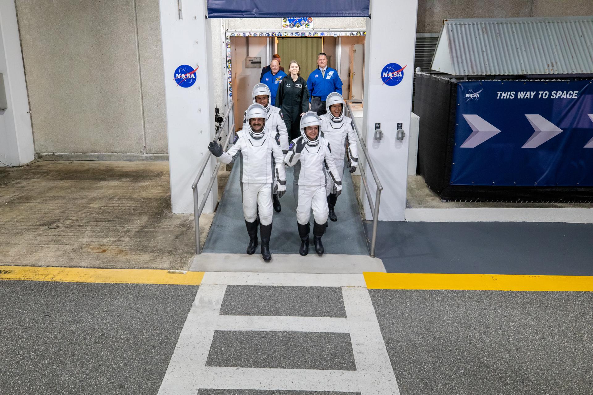 NASA’s SpaceX Crew-12 crew members walk out of the Neil A. Armstrong Operations and Checkout Building at the agency’s Kennedy Space Center in Florida for nearby Space Launch Complex 40 at Cape Canaveral Space Force Station for launch of Crew-12 on Friday, Feb. 13, 2026. NASA astronauts Jack Hathaway (left) and Jessica Meir (right) are followed by Roscosmos cosmonaut Andrey Fedyaev and ESA (European Space Agency) astronaut Sophie Adenot as they wave to family and friends as they depart. Crew-12 is scheduled to lift off aboard SpaceX’s Dragon spacecraft and Falcon 9 rocket to the International Space Station at 5:15 a.m. EST.