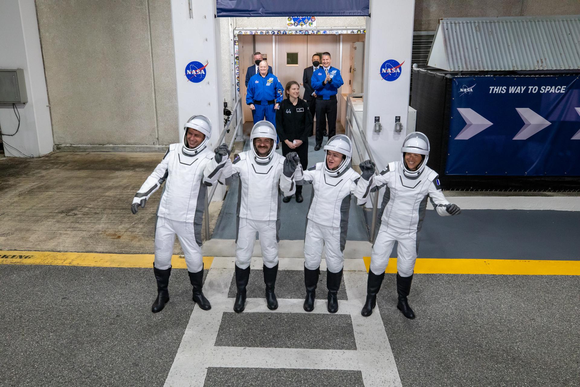 NASA’s SpaceX Crew-12 crew members wave to family and friends as they depart the Neil A. Armstrong Operations and Checkout Building at the agency’s Kennedy Space Center in Florida for nearby Space Launch Complex 40 at Cape Canaveral Space Force Station ahead of launch on Friday, Feb. 13, 2026. From left, Roscosmos cosmonaut Andrey Fedyaev, NASA astronauts Jack Hathaway and Jessica Meir, and ESA (European Space Agency) astronaut Sophie Adenot are scheduled to lift off aboard SpaceX’s Dragon spacecraft and Falcon 9 rocket to the International Space Station at 5:15 a.m. EST.