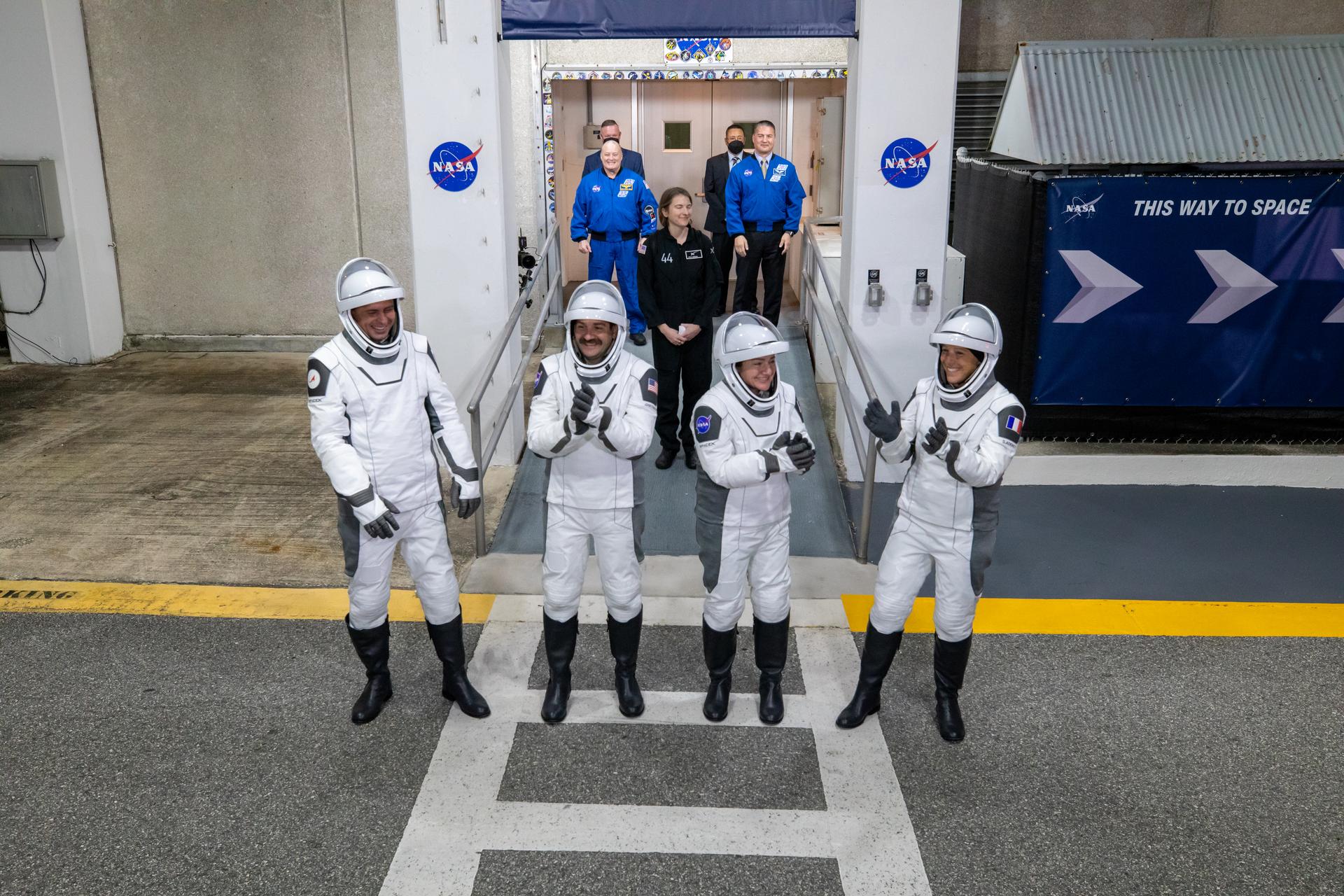 NASA’s SpaceX Crew-12 crew members wave to family and friends as they depart the Neil A. Armstrong Operations and Checkout Building at the agency’s Kennedy Space Center in Florida for nearby Space Launch Complex 40 at Cape Canaveral Space Force Station ahead of launch on Friday, Feb. 13, 2026. From left, Roscosmos cosmonaut Andrey Fedyaev, NASA astronauts Jack Hathaway and Jessica Meir, and ESA (European Space Agency) astronaut Sophie Adenot are scheduled to lift off aboard SpaceX’s Dragon spacecraft and Falcon 9 rocket to the International Space Station at 5:15 a.m. EST.