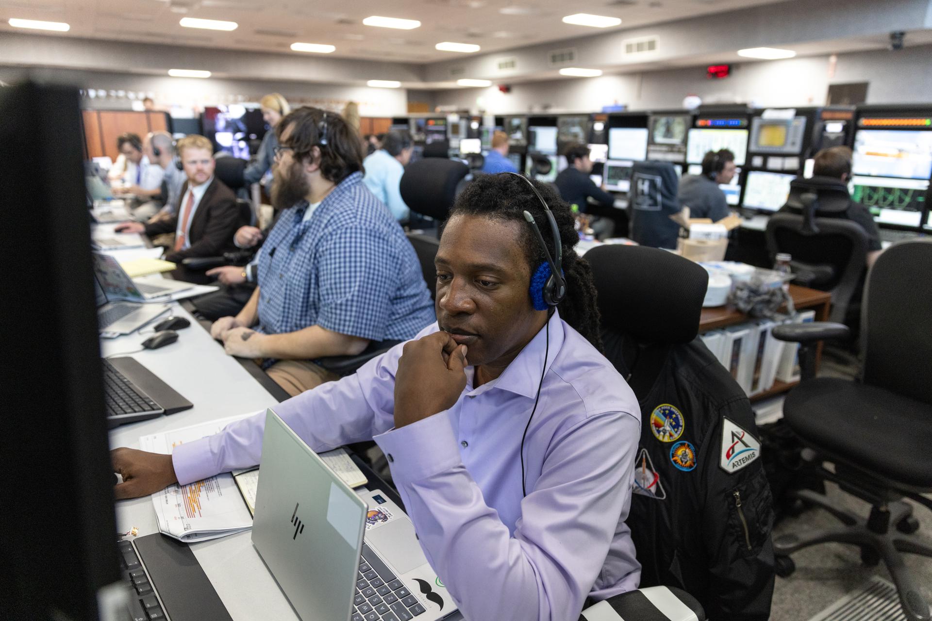 Josh Jones, Artemis launch team member, participates in the second wet dress rehearsal for the Artemis II mission on Thursday, Feb. 19, 2026, inside Firing Room 1 at the Rocco A. Petrone Launch Control Center at NASA’s Kennedy Space Center in Florida. The wet dress rehearsal allows the Artemis II launch team to run through operations to load propellant, conduct a full launch countdown, demonstrate the ability to recycle the countdown clock, and drain the tanks to practice timelines and procedures for launch. The Artemis II test flight will take Commander Reid Wiseman, Pilot Victor Glover, and Mission Specialist Christina Koch from NASA, and Mission Specialist Jeremy Hansen from the CSA (Canadian Space Agency), around the Moon and back to Earth from Launch Complex 39B at NASA Kennedy.