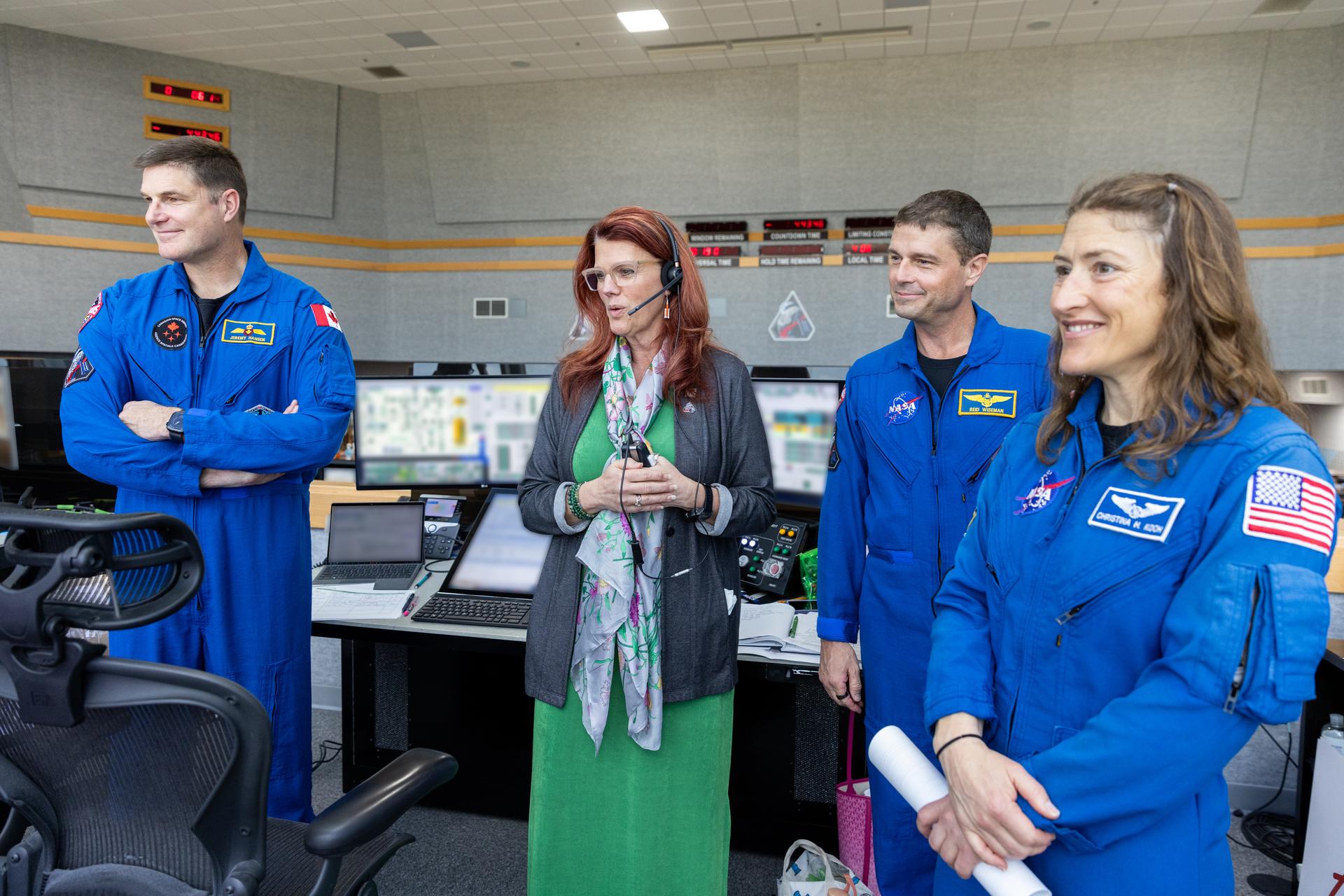 From left, CSA (Canadian Space Agency) Jeremy Hansen, Artemis II mission specialist; Artemis Launch Director Charlie Blackwell-Thompson; NASA astronaut Reid Wiseman, Artemis II commander; and NASA astronaut Christina Koch, Artemis II mission specialist; and NASA astronaut Victor Glover, Artemis II pilot (not pictured), participate in the second wet dress rehearsal for the Artemis II mission on Thursday, Feb. 19, 2026, inside Firing Room 1 at the Rocco A. Petrone Launch Control Center at NASA’s Kennedy Space Center in Florida. The wet dress rehearsal allows the Artemis II launch team to run through operations to load propellant, conduct a full launch countdown, demonstrate the ability to recycle the countdown clock, and drain the tanks to practice timelines and procedures for launch. 