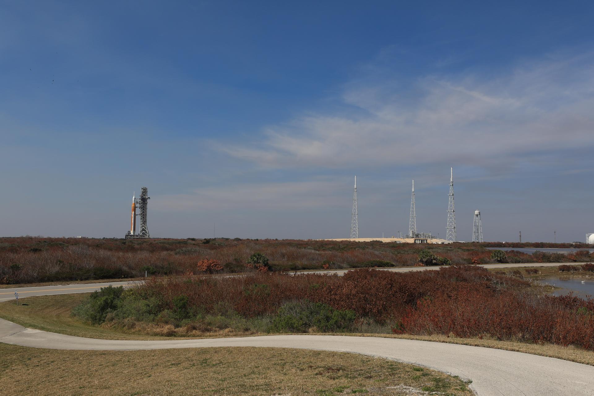NASA’s crawler-transporter 2, carrying NASA’s Artemis II SLS (Space Launch System) rocket with the Orion spacecraft secured to mobile launcher 1, rolls back Wednesday, Feb. 25, 2026, to the Vehicle Assembly Building at NASA’s Kennedy Space Center in Florida to troubleshoot the flow of helium to the rocket’s upper stage, the interim cryogenic propulsion stage. Once complete, the SLS rocket will roll back to Launch Complex 39B to prepare to launch four astronauts around the Moon and back for the Artemis II test flight. 