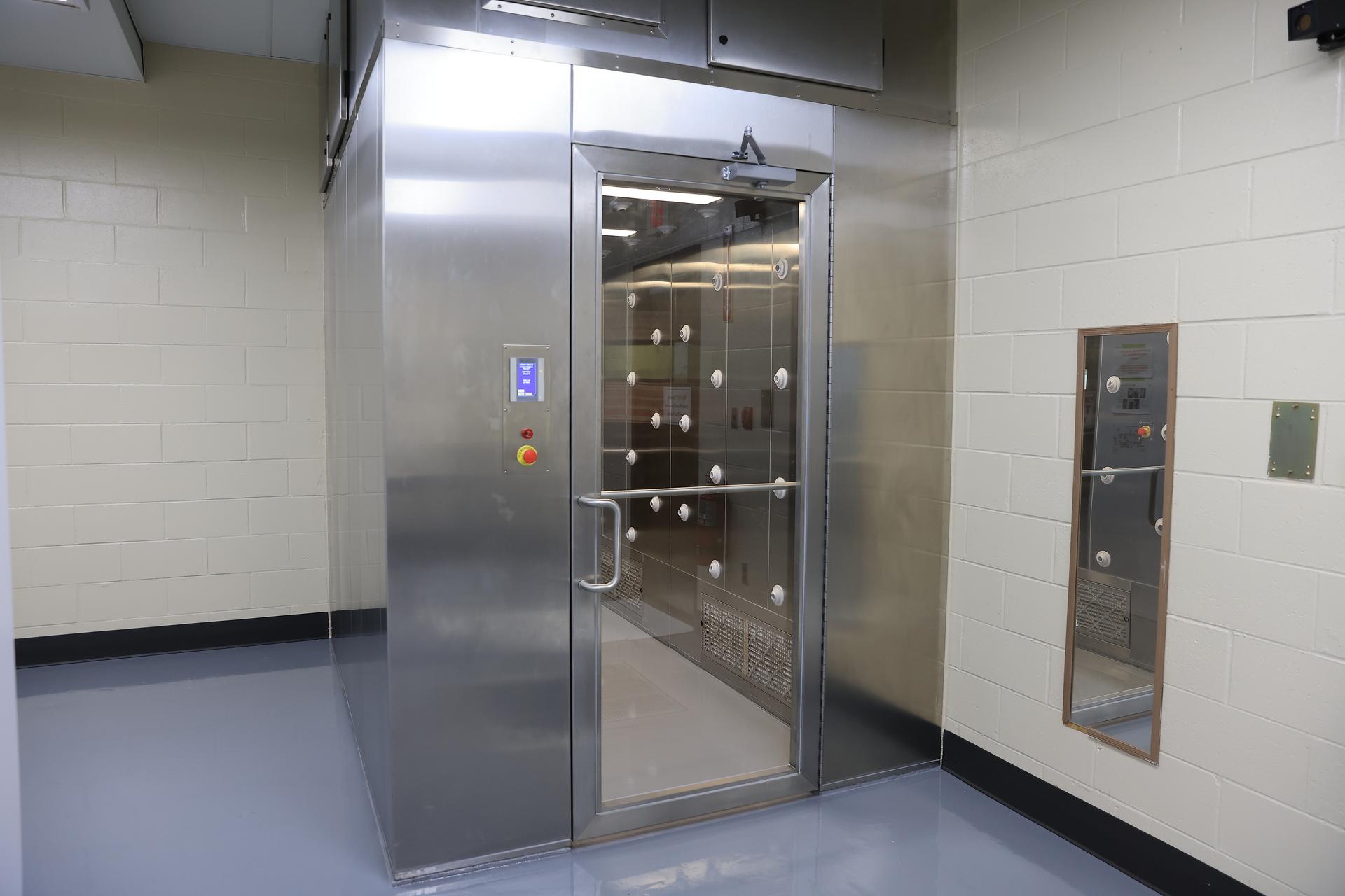 This image shows the recently upgraded air showers which blast high-velocity HEPA-filtered air onto people before they enter a clean room at NASA’s Payload Hazardous Servicing Facility at the agency’s Kennedy Space Center in Florida on Friday, Feb. 27, 2026. The PHSF went through several upgrades ahead of the arrival of Nancy Grace Roman Space Telescope. Roman will provide deep, panoramic views of the cosmos, generating never-before-seen pictures that will revolutionize our understanding of the universe. Roman will undergo several prelaunch operations, including thermal protection closeout, cleaning, solar array work, and loading hydrazine propellant.  