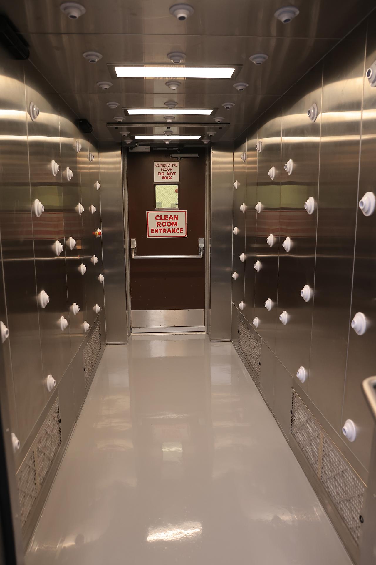 This image shows the recently upgraded air showers which blast high-velocity HEPA-filtered air onto people before they enter a clean room at NASA’s Payload Hazardous Servicing Facility at the agency’s Kennedy Space Center in Florida on Friday, Feb. 27, 2026. The PHSF went through several upgrades ahead of the arrival of Nancy Grace Roman Space Telescope. Roman will provide deep, panoramic views of the cosmos, generating never-before-seen pictures that will revolutionize our understanding of the universe. Roman will undergo several prelaunch operations, including thermal protection closeout, cleaning, solar array work, and loading hydrazine propellant.  