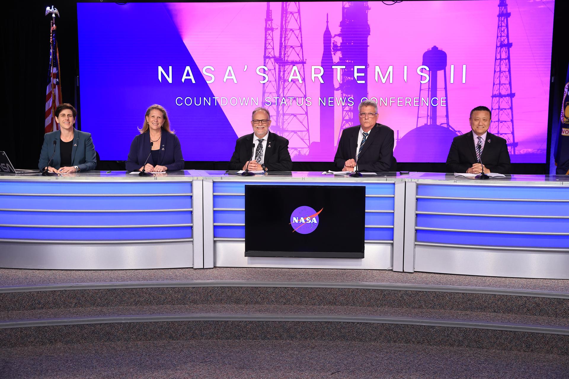 From left to right, Rachel Kraft, NASA communications; Lori Glaze, acting associate administrator, Exploration Systems Development Mission Directorate; Shawn Quinn, program manager, Exploration Ground Systems; Chris Cianciola, deputy manager, NASA’s SLS (Space Launch System) Program; and Howard Hu, manager, Orion Program, participates in a news conference on Sunday, March 29, 2026, to discuss the upcoming Artemis II test flight at NASA’s Kennedy Space Center in Florida. The Artemis II mission will take Artemis II Commander Reid Wiseman, Pilot Victor Glover, and Mission Specialist Christina Koch from NASA, and Mission Specialist Jeremy Hansen from the CSA (Canadian Space Agency) on a 10-day journey around the Moon and back aboard NASA’s SLS (Space Launch System) rocket and Orion spacecraft from Launch Complex 39B no earlier than 6:24 p.m. EDT on Wednesday, April 1.  