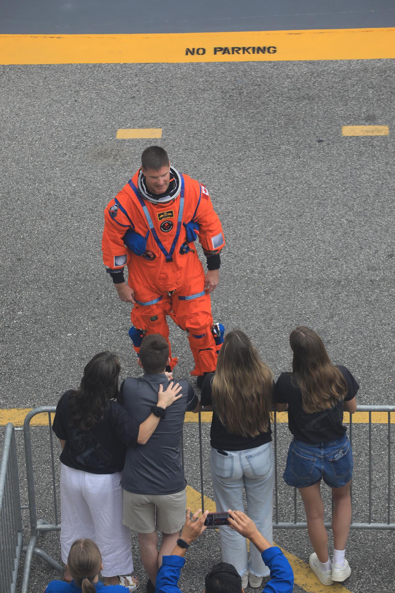 Artemis II Mission Specialist Jeremy Hansen from the CSA (Canadian Space Agency), waves to family and friends as he prepares to depart the Neil A. Armstrong Operations and Checkout Building for Launch Pad 39B at the agency’s Kennedy Space Center in Florida on Wednesday, April 1, 2026, ahead of the Artemis II test flight. The mission will take Hansen, Commander Reid Wiseman, Pilot Victor Glover, and Mission Specialist Christina Koch, from NASA, on a 10-day journey around the Moon and back aboard NASA’s SLS (Space Launch System) rocket and Orion spacecraft with a two hour launch window opening at 6:24 p.m. EDT from Launch Complex 39B at NASA Kennedy. 
