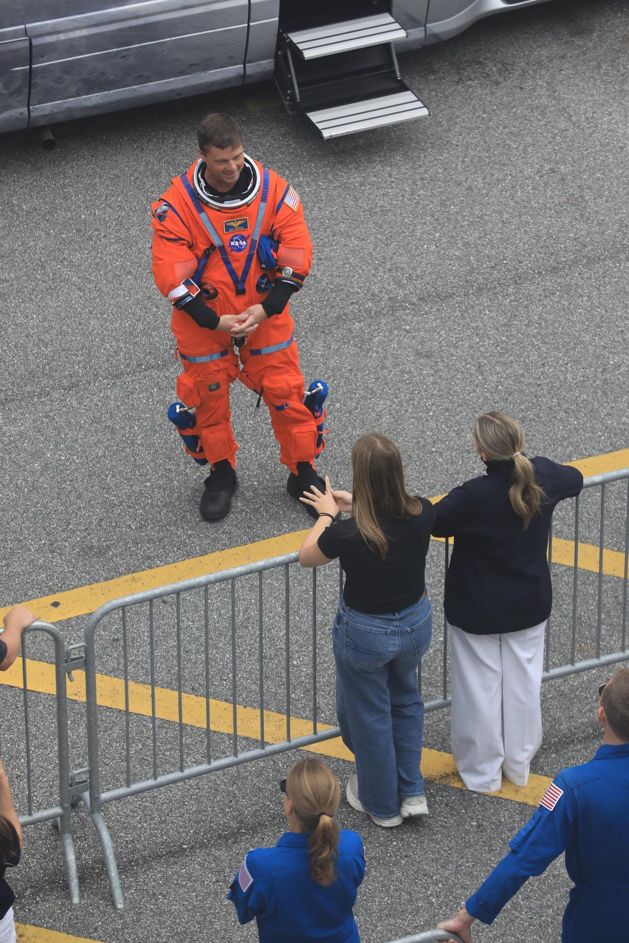 Artemis II Commander Reid Wiseman greets family and friends as he prepares to depart the Neil A. Armstrong Operations and Checkout Building for Launch Pad 39B at the agency’s Kennedy Space Center in Florida on Wednesday, April 1, 2026, ahead of the Artemis II test flight. The mission will take Wiseman, Pilot Victor Glover, and Mission Specialist Christina Koch from NASA, along with Mission Specialist Jeremy Hansen from the CSA (Canadian Space Agency), on a 10-day journey around the Moon and back aboard NASA’s SLS (Space Launch System) rocket and Orion spacecraft with a two hour launch window opening at 6:24 p.m. EDT from Launch Complex 39B at NASA Kennedy.